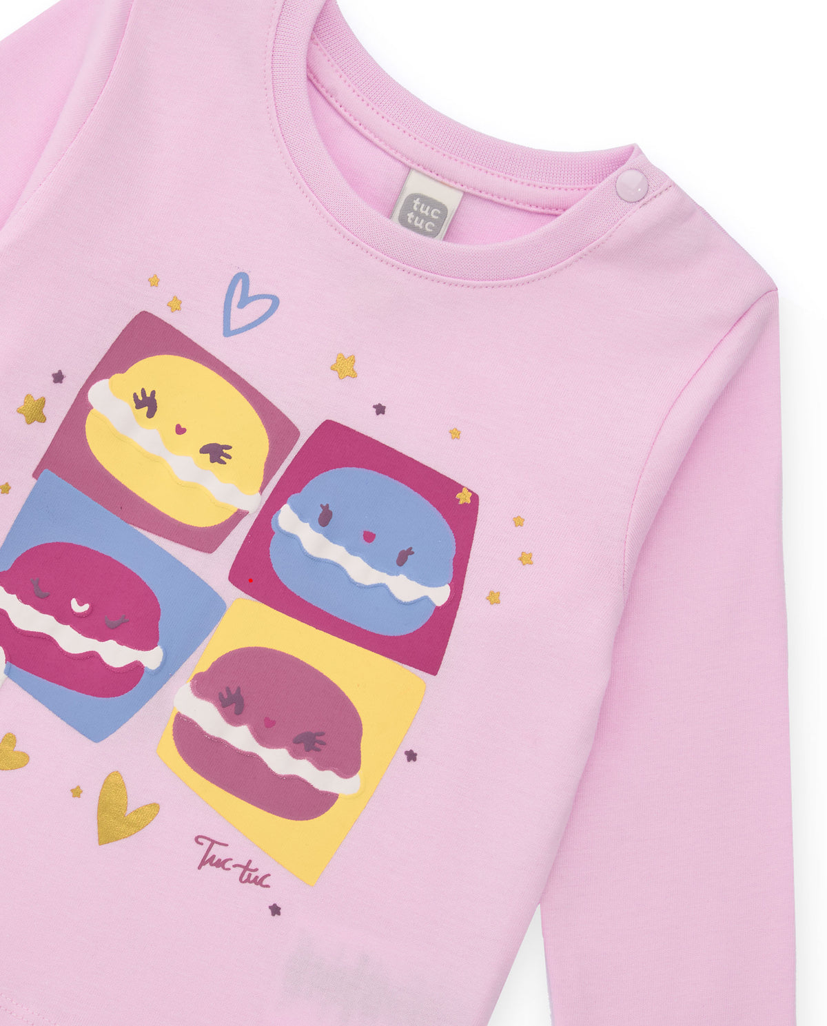 Pijama de punto para niña color rosa con estampado de macarons.