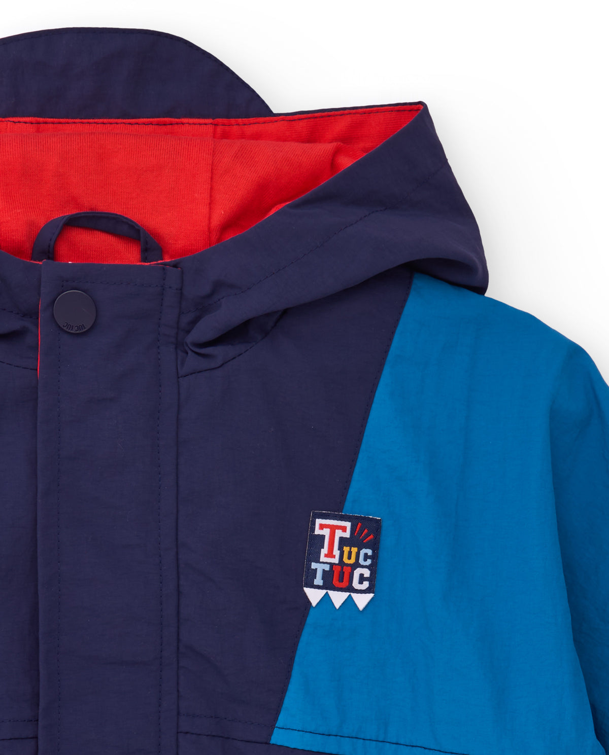 Chaqueta cortavientos de niño en bloques de color azul marino y