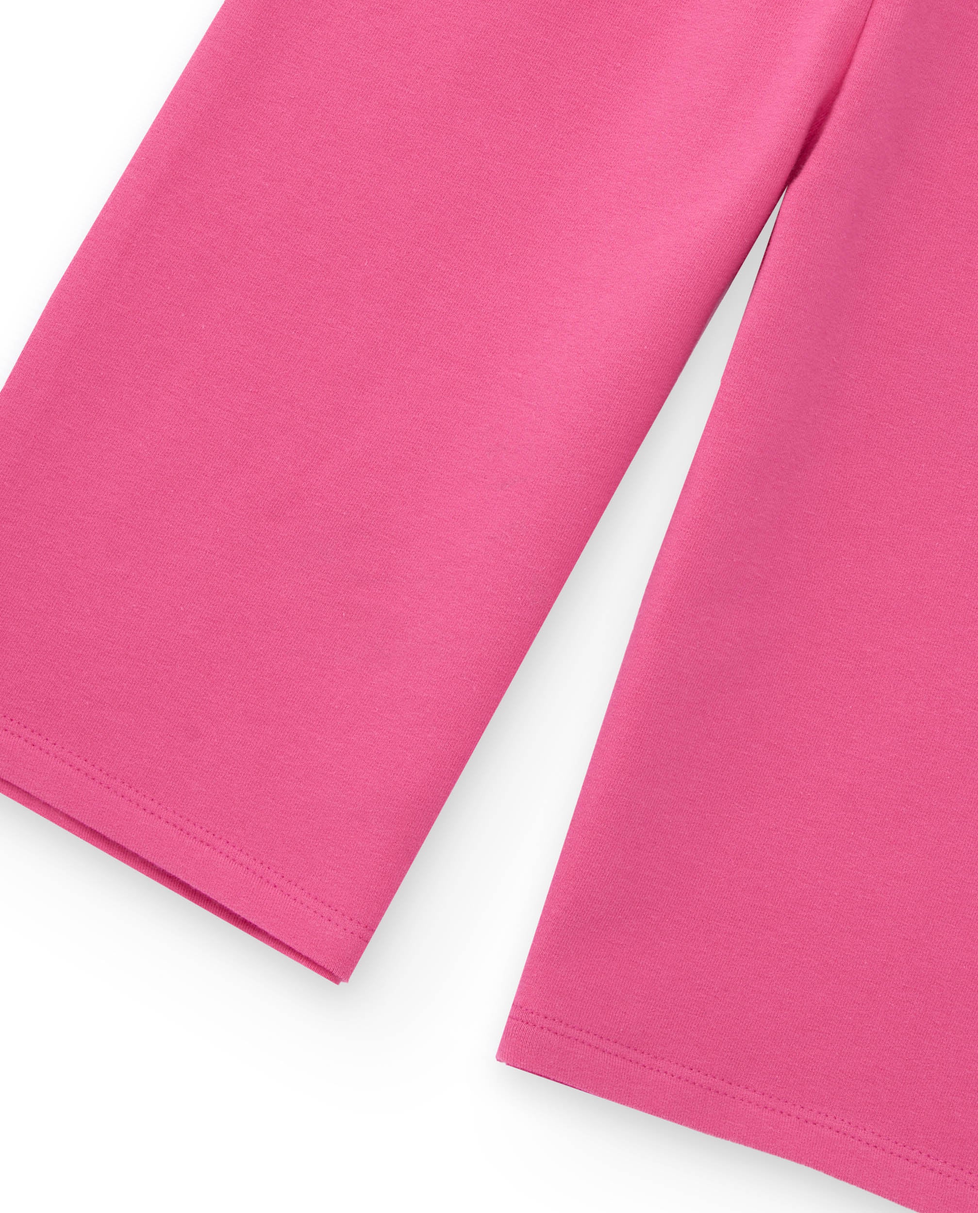 Pantalón de punto para niña en color rosa con detalle de
