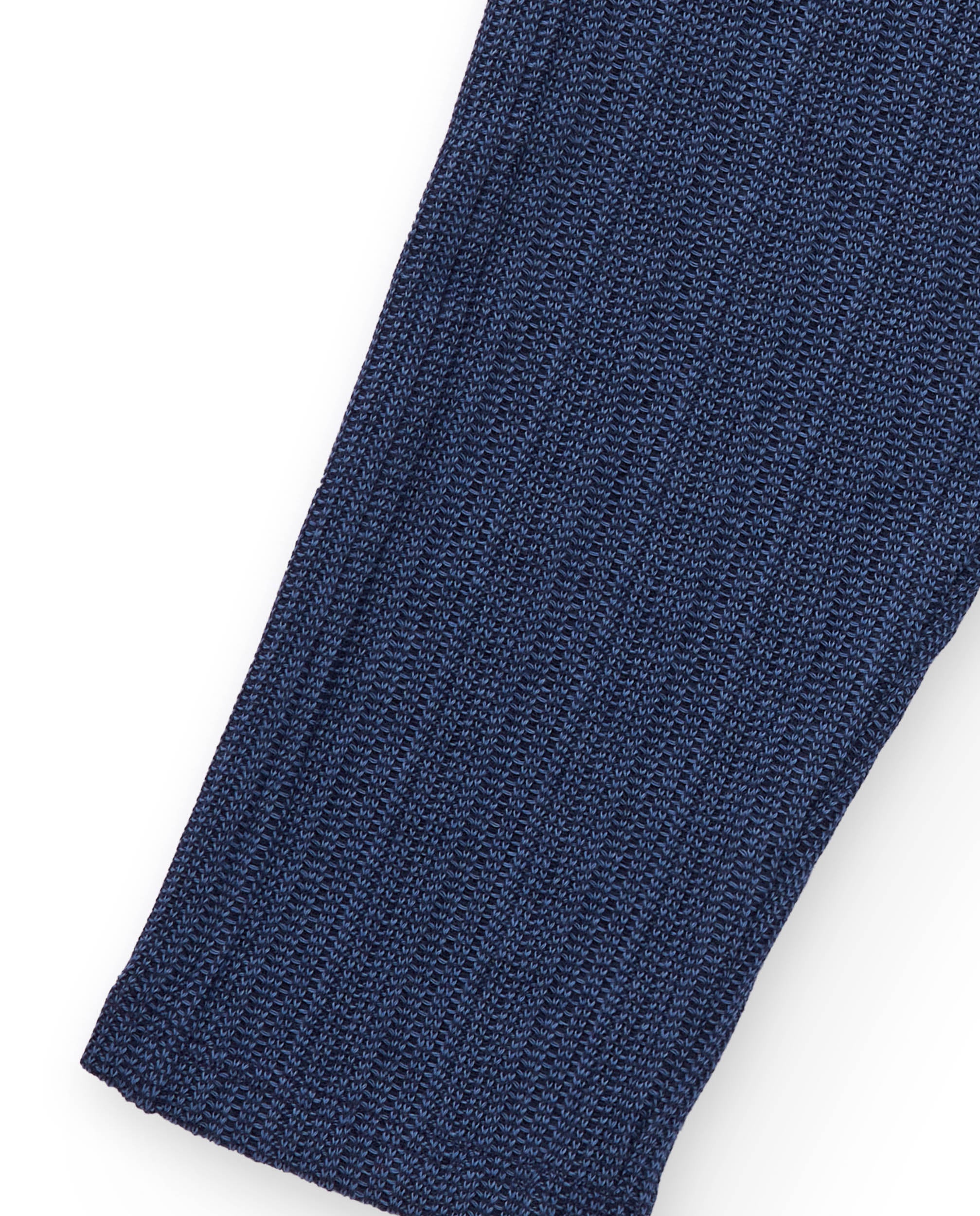 Pantalón de punto para niño color azul marino con bordado de