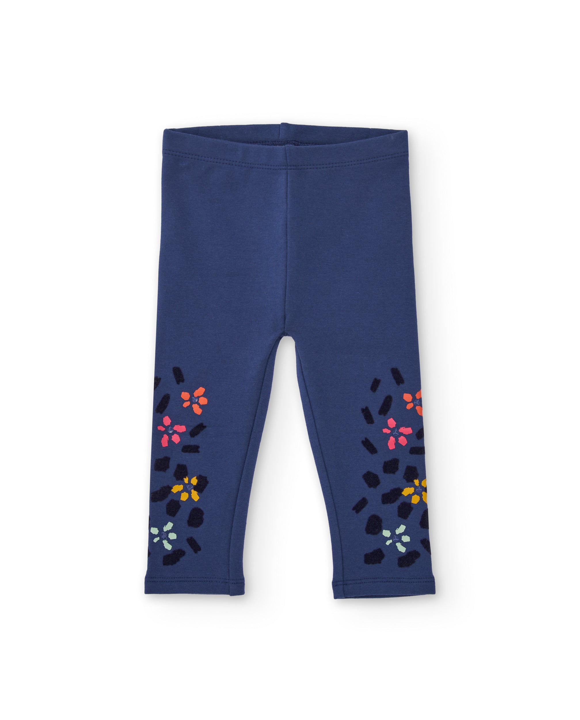 Leggings para niña en color azul marino con estampado de flores.