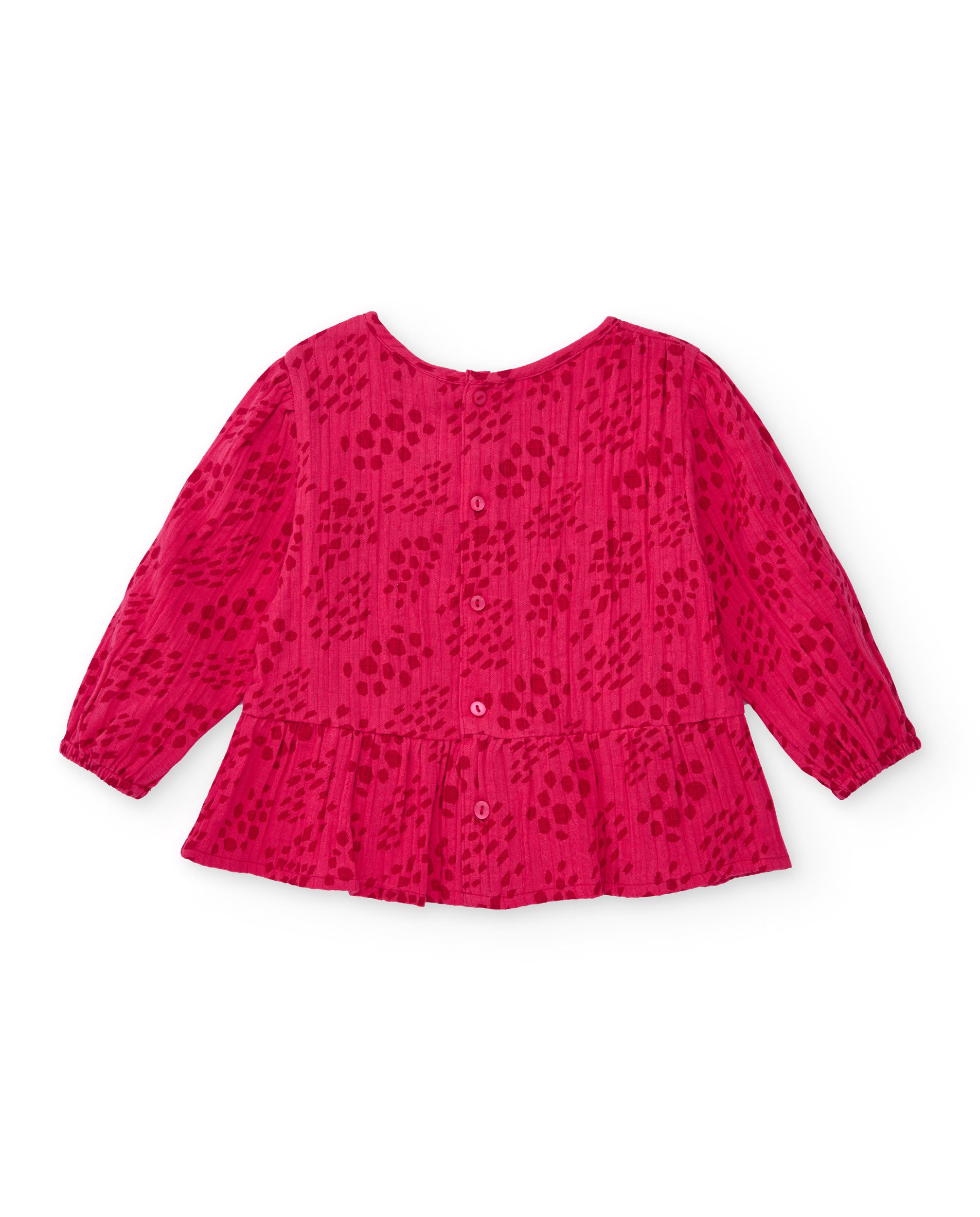 Blusa para niña color fucsia con detalle de nido de abeja.
