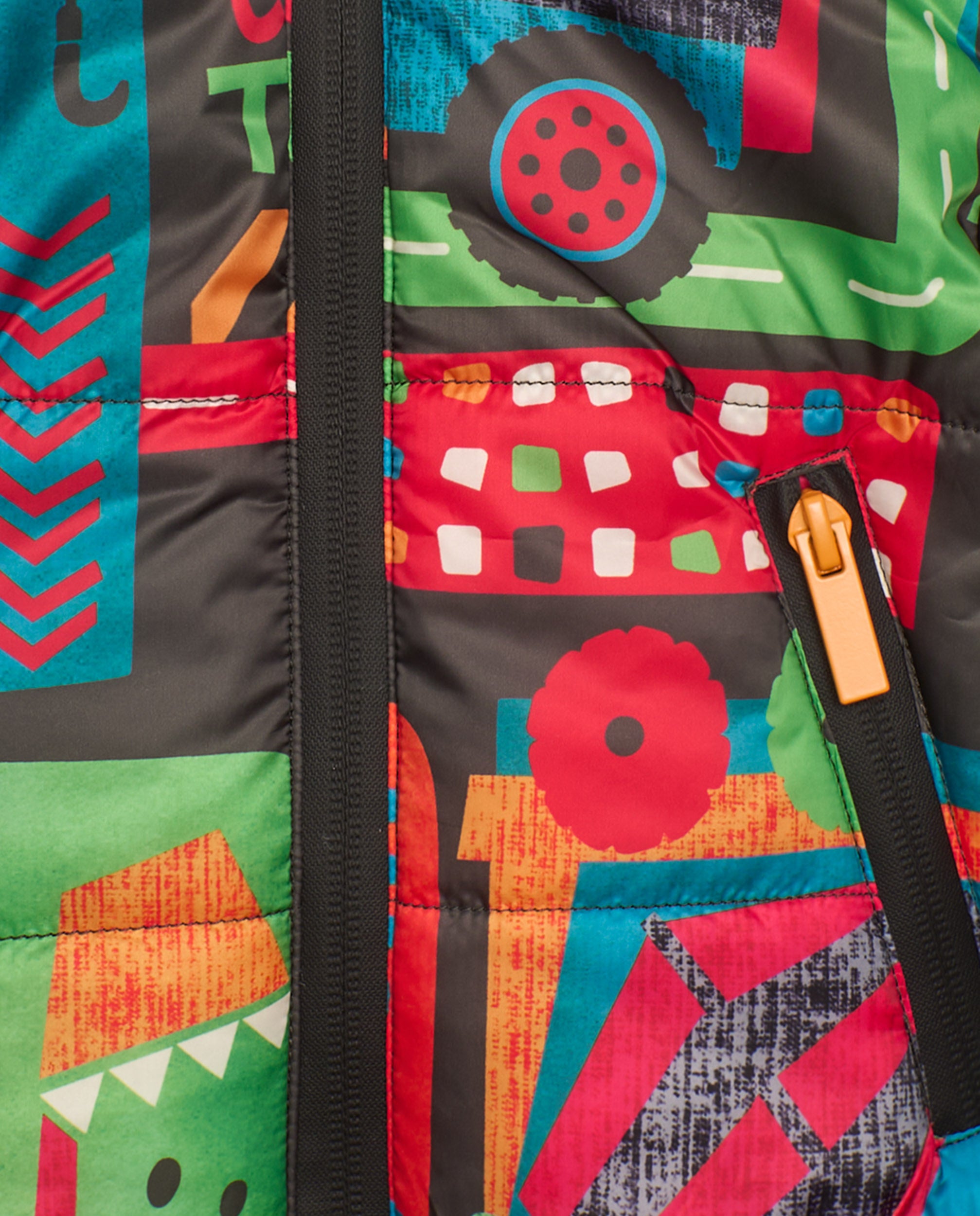Plumífero para niño en multicolor con estampado de vehículos