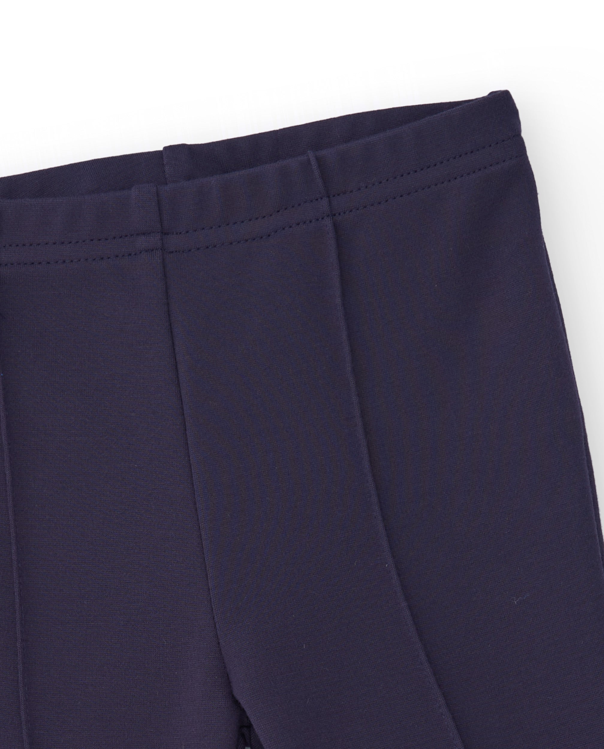 Pantalones acampanados para niña en azul marino con detalle