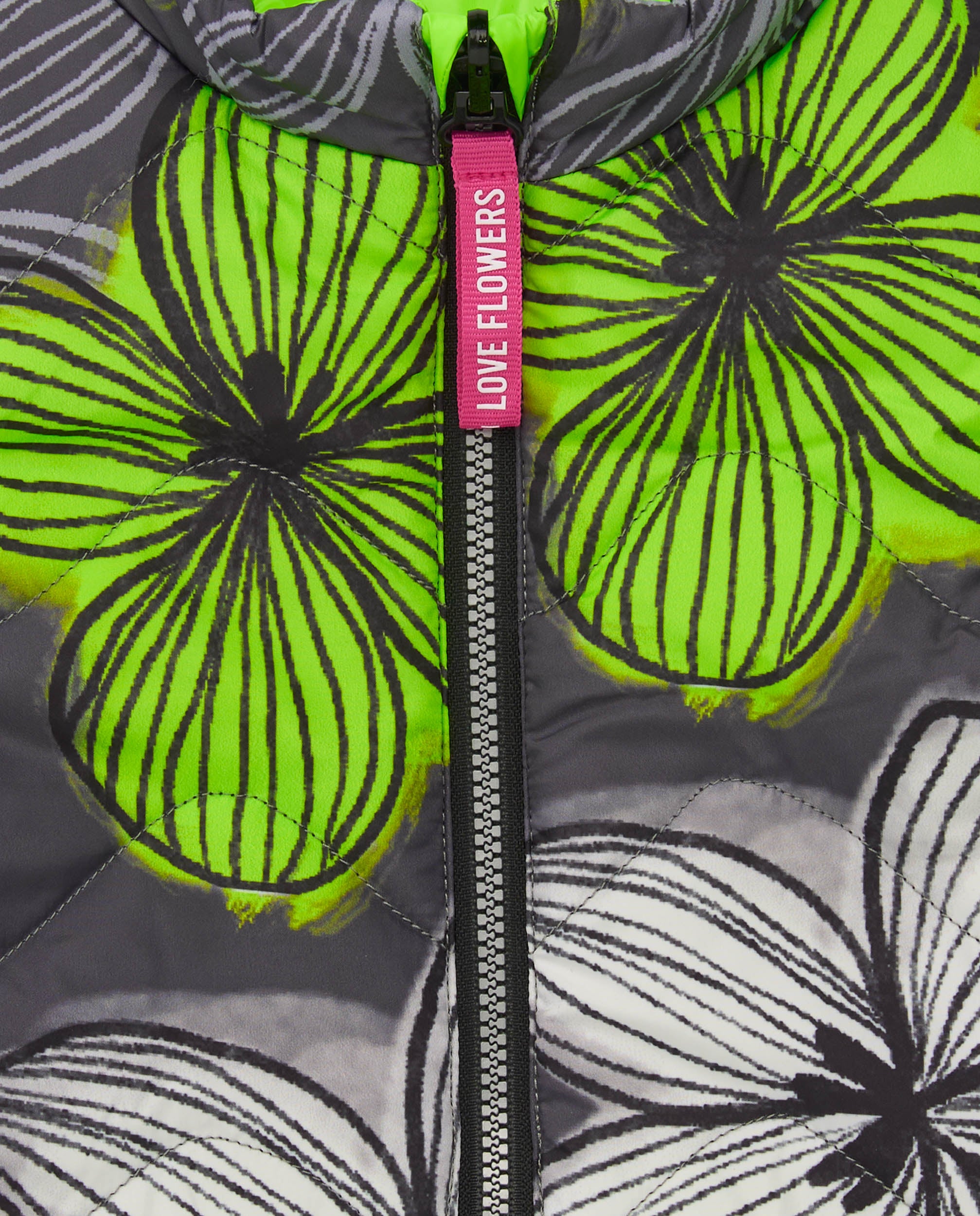 Chaleco reversible para niña en verde flúor con flores