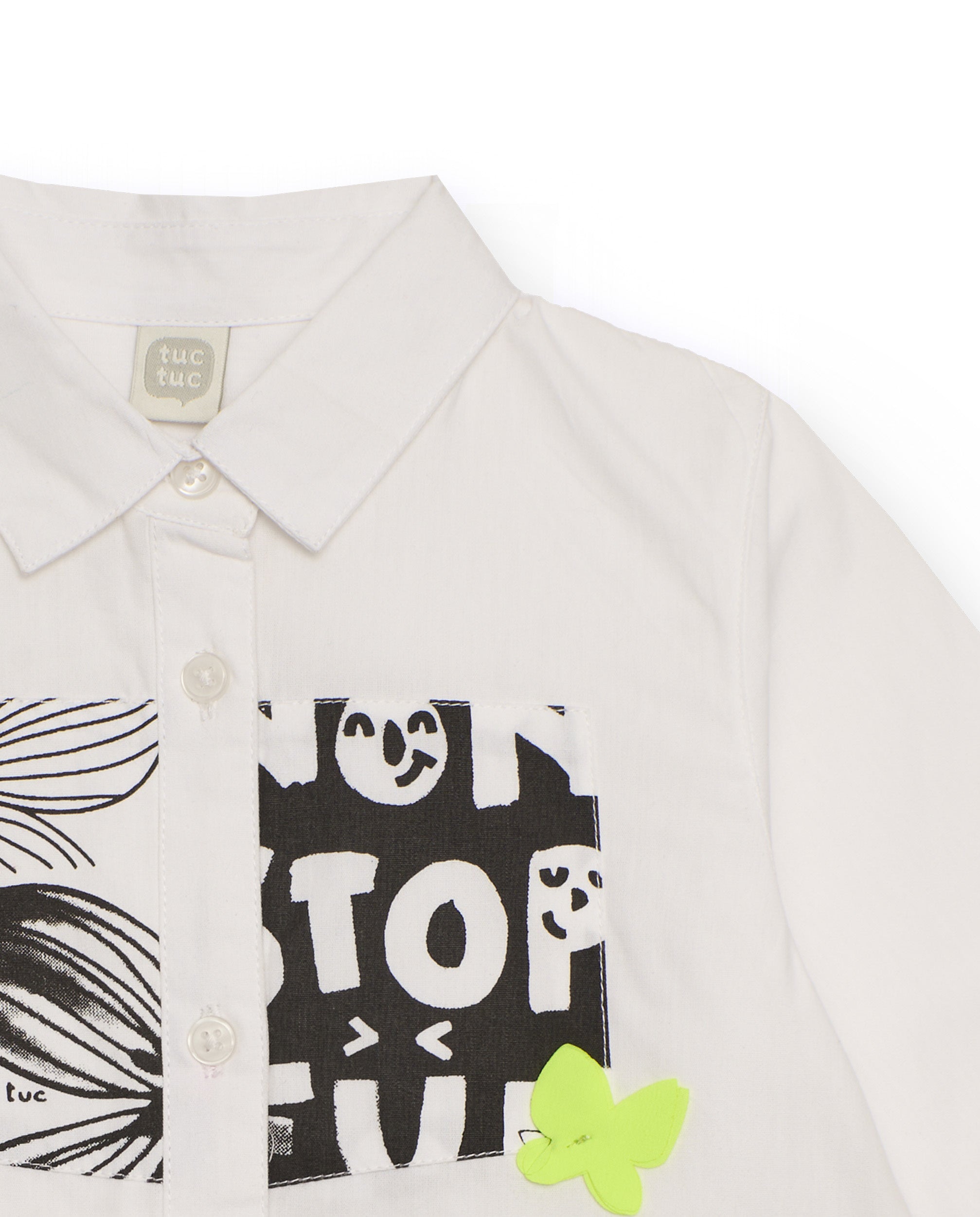 Camisa niña en blanco con falda de tul negra y estampado
