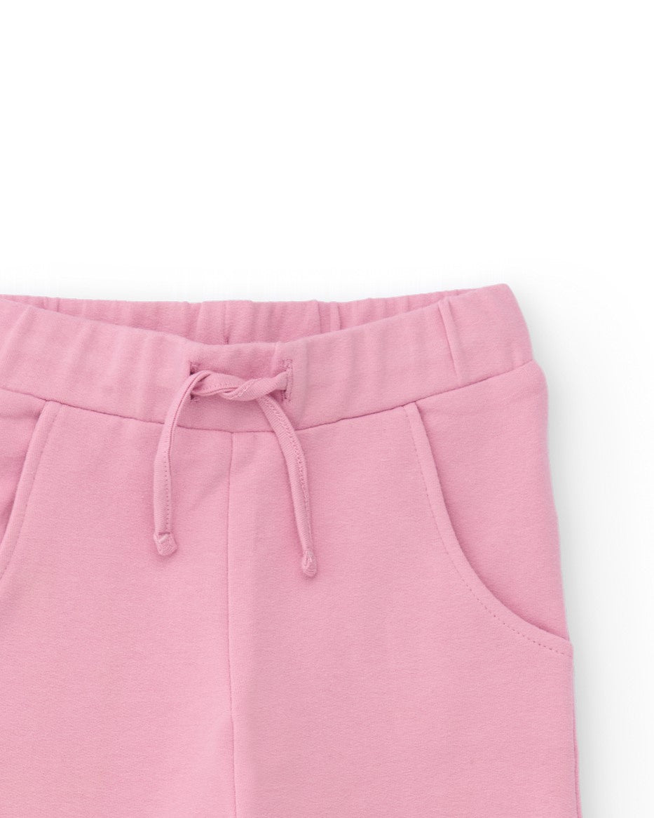 Pantalón de felpa para niña en rosa con estampado de arcoíris