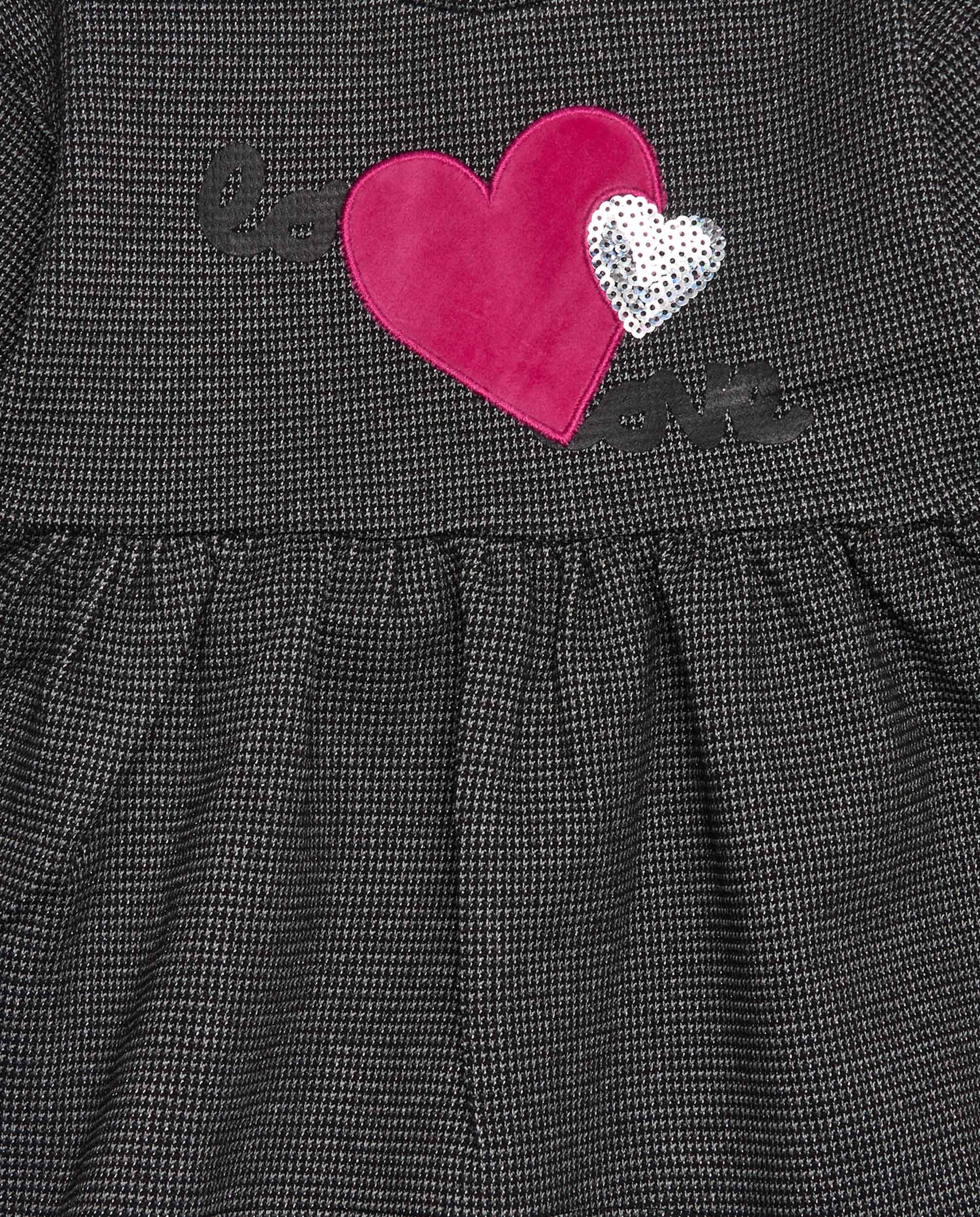 Vestido de niña en gris con corazones aplicados
