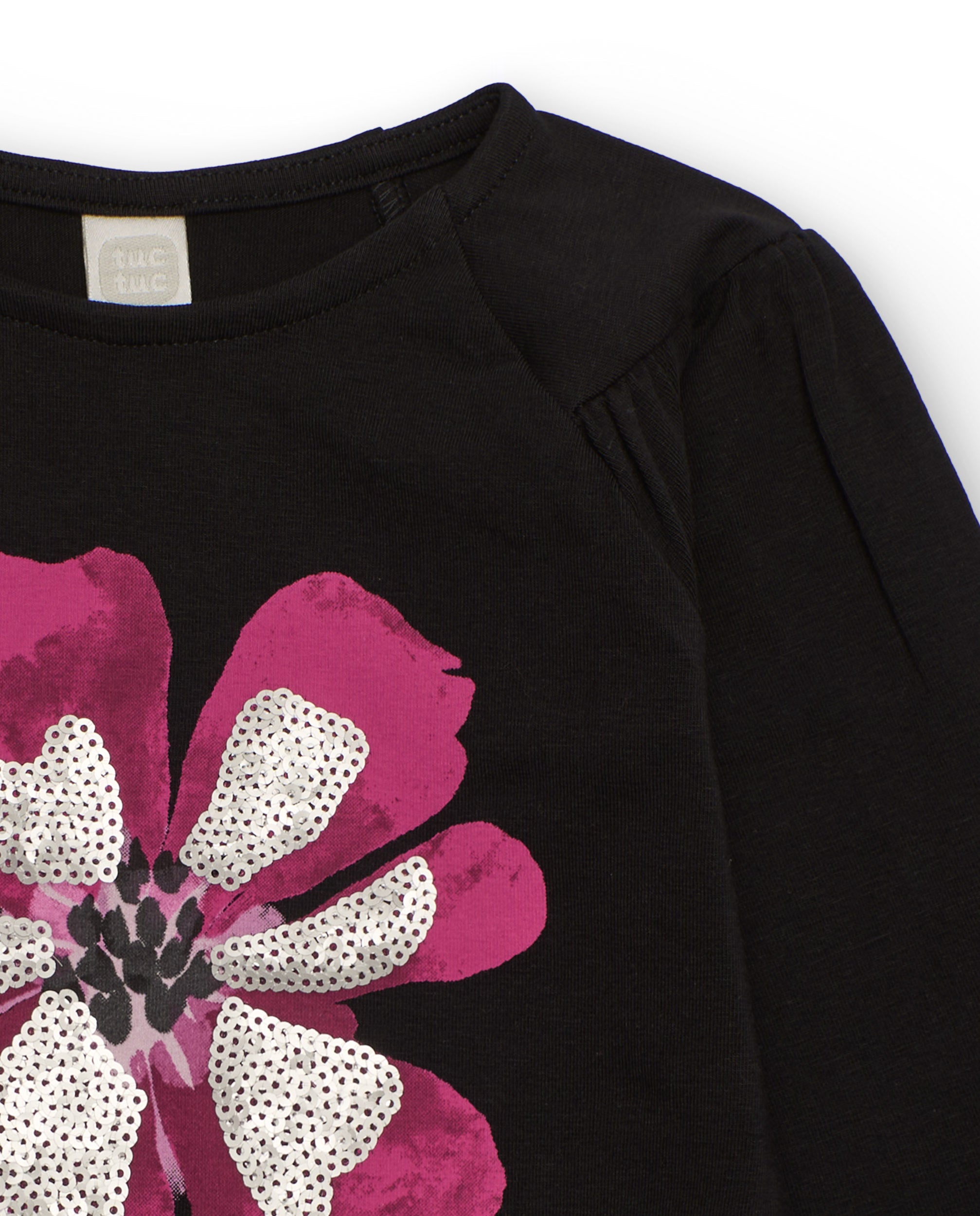 Camiseta de niña en negro con flor fucsia y lentejuelas