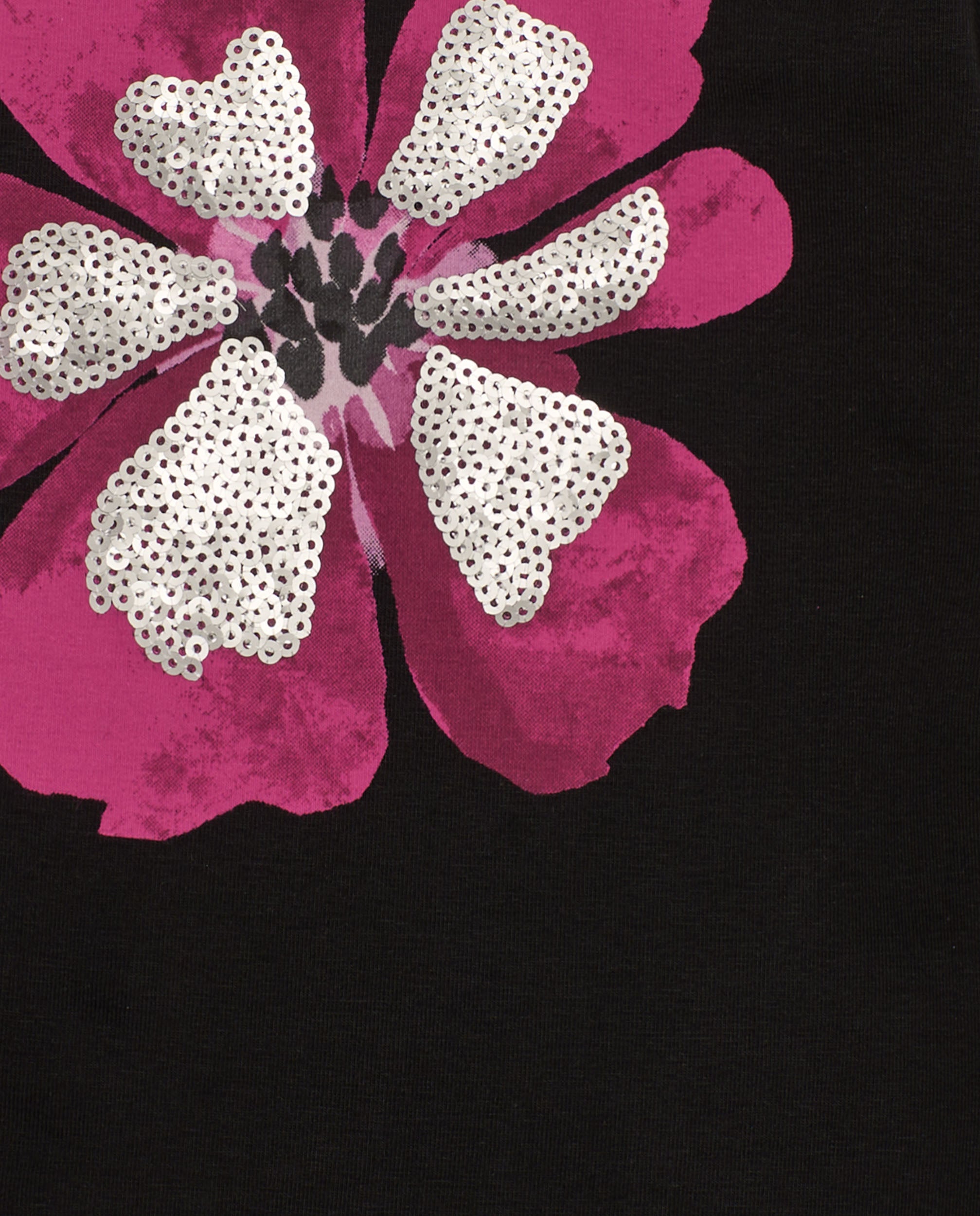 Camiseta de niña en negro con flor fucsia y lentejuelas