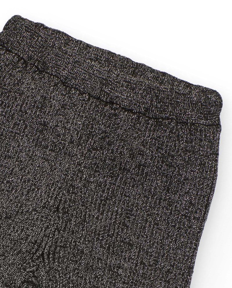 Pantalón de punto para niña en gris con volante en el bajo
