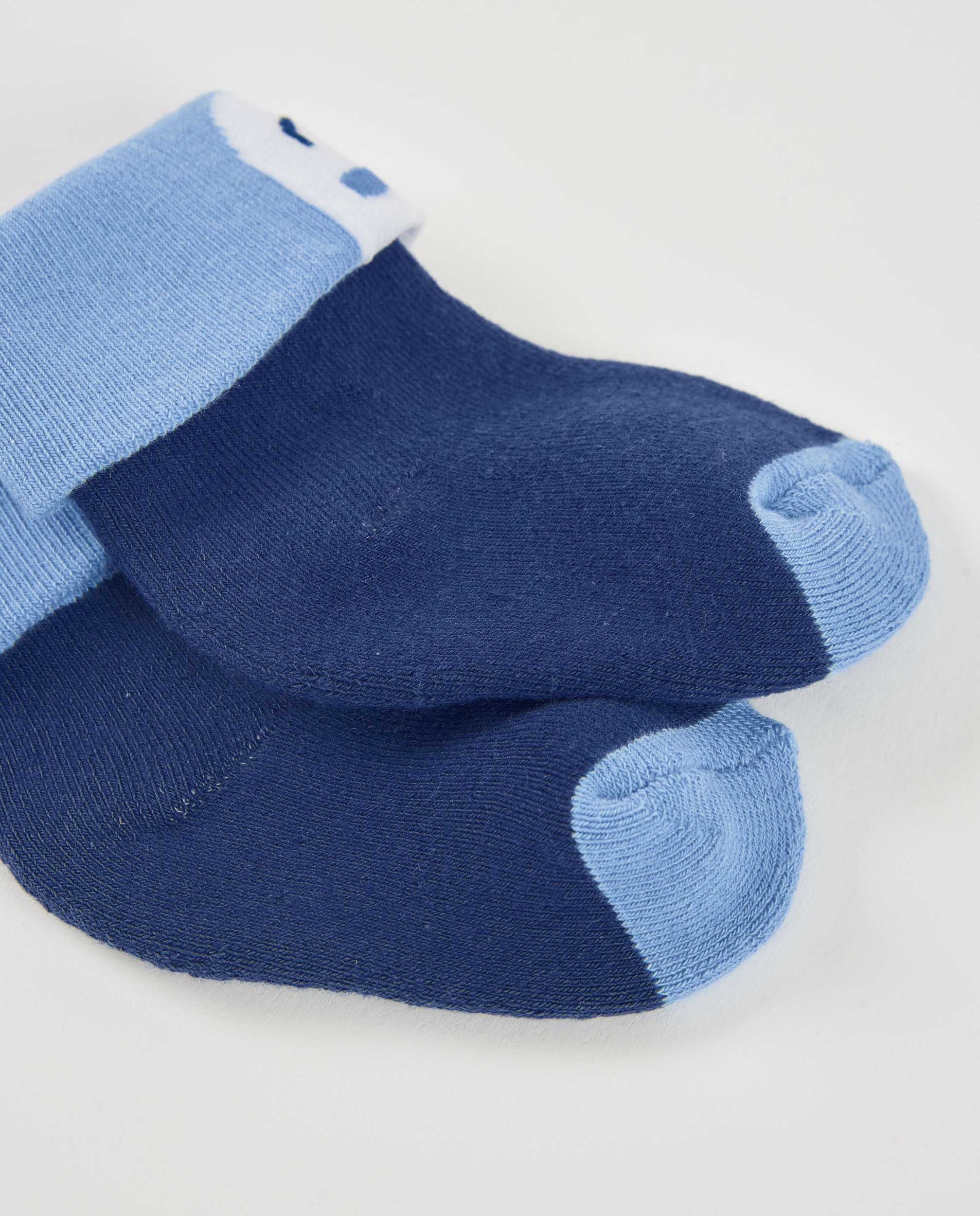 Calcetines para recién nacido en azul marino y celeste con
