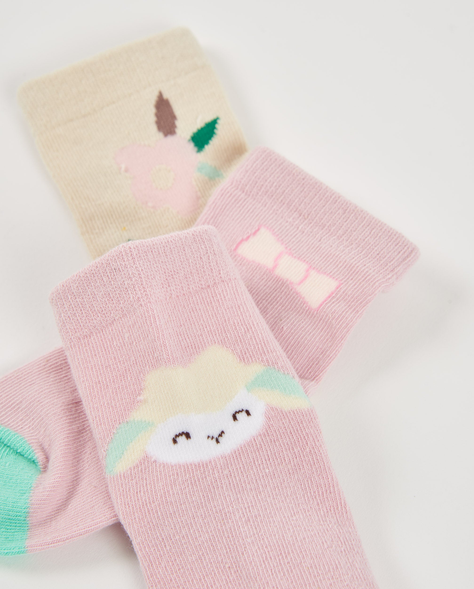 Set de 3 pares de calcetines para recién nacido en tonos rosa y