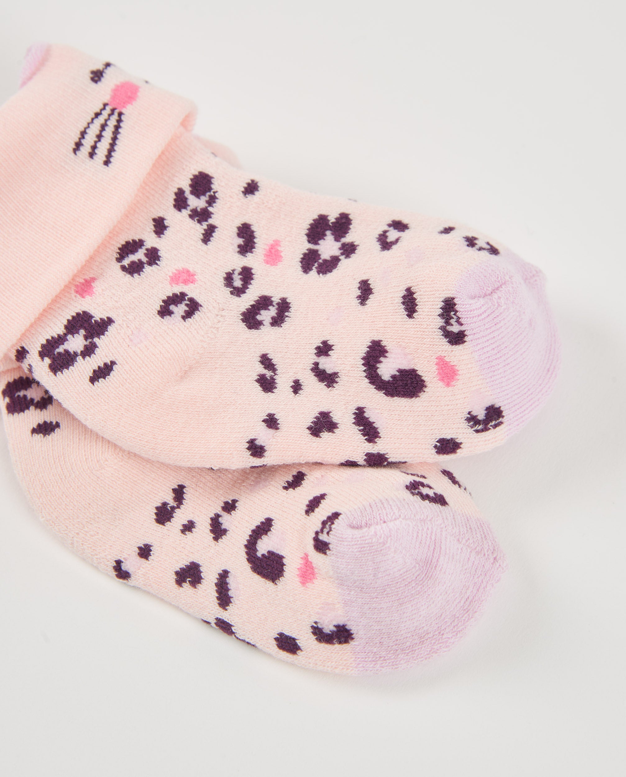 Calcetines de punto para recién nacido color rosa con diseño de