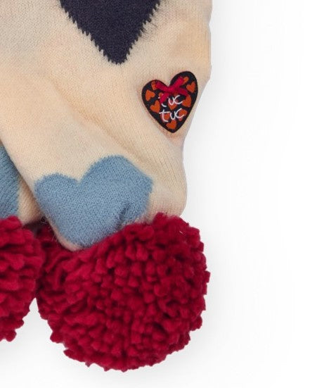 Bufanda para niña en beige con estampado de corazones y pompones