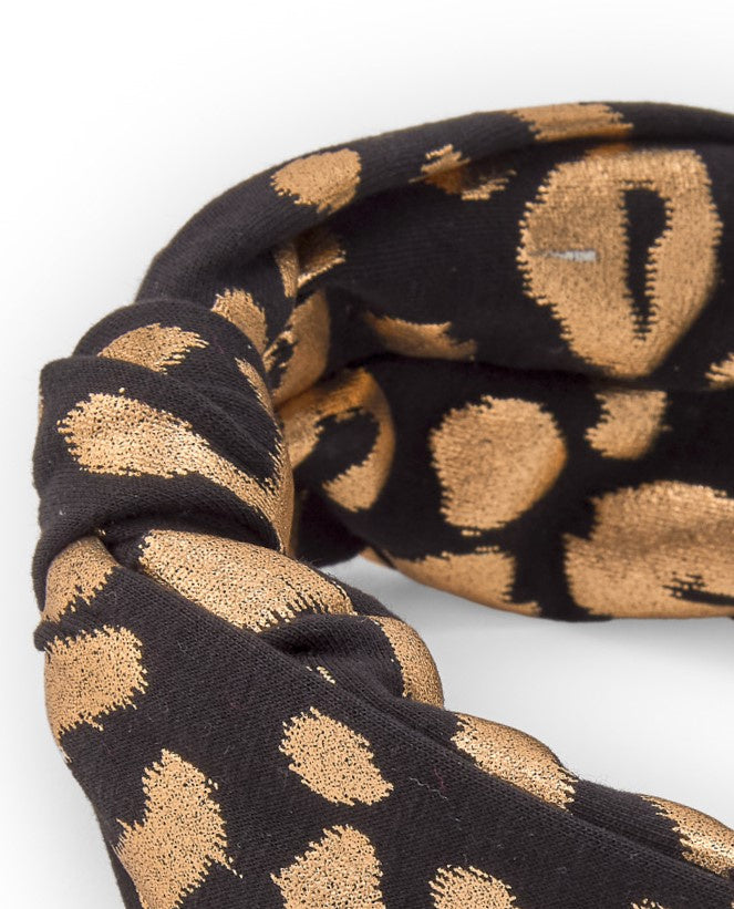 Diadema de niña con estampado de leopardo dorado