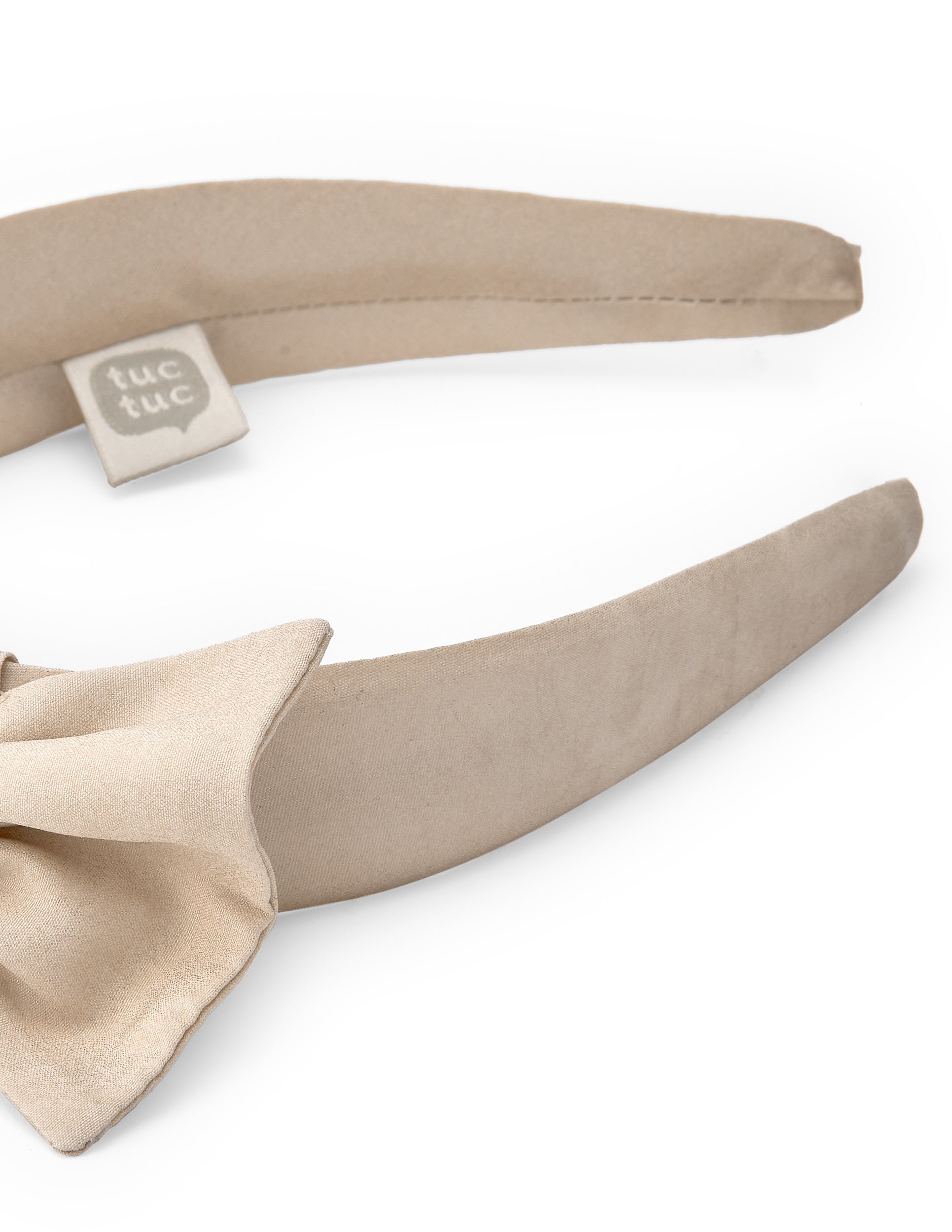 Diadema de niña en beige con gran lazo decorativo