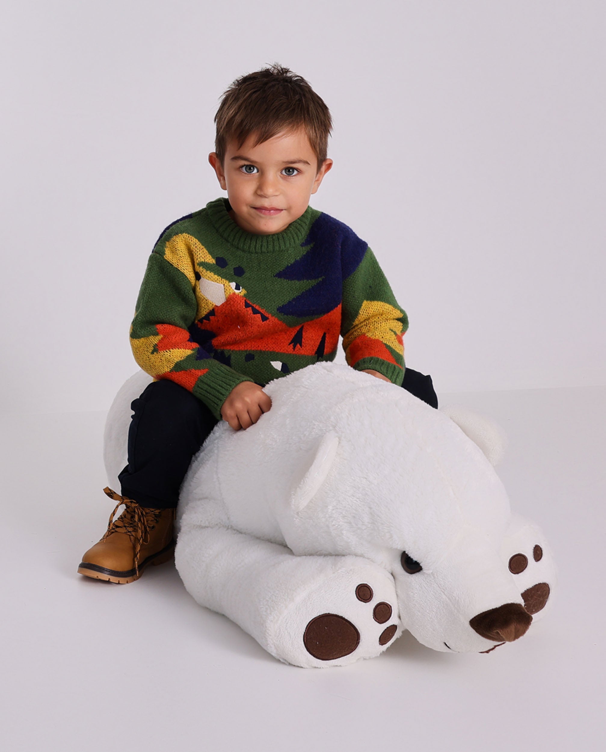 Suéter de punto para niño multicolor con diseño de dragón.