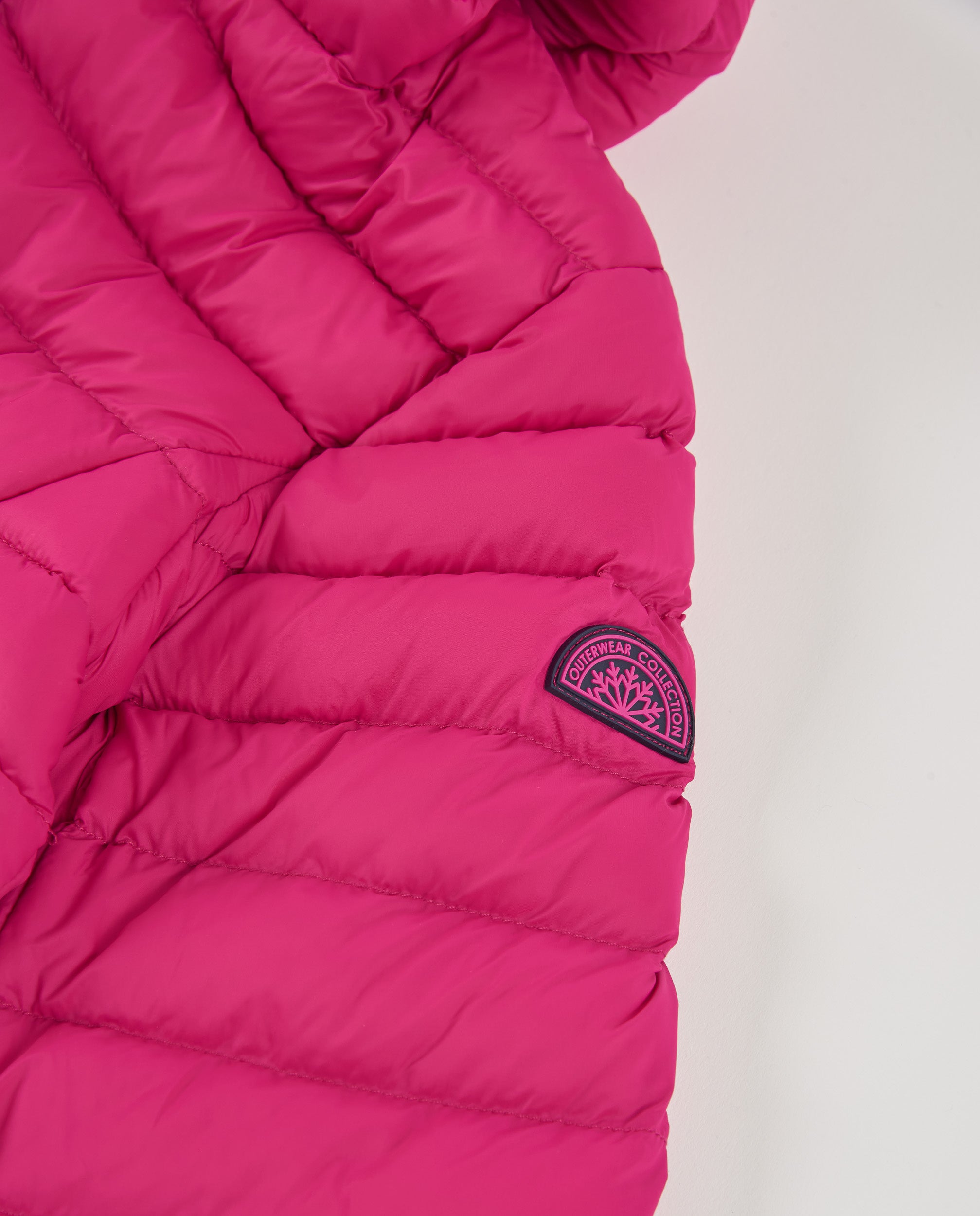 Chaqueta acolchada de niña color fucsia con capucha