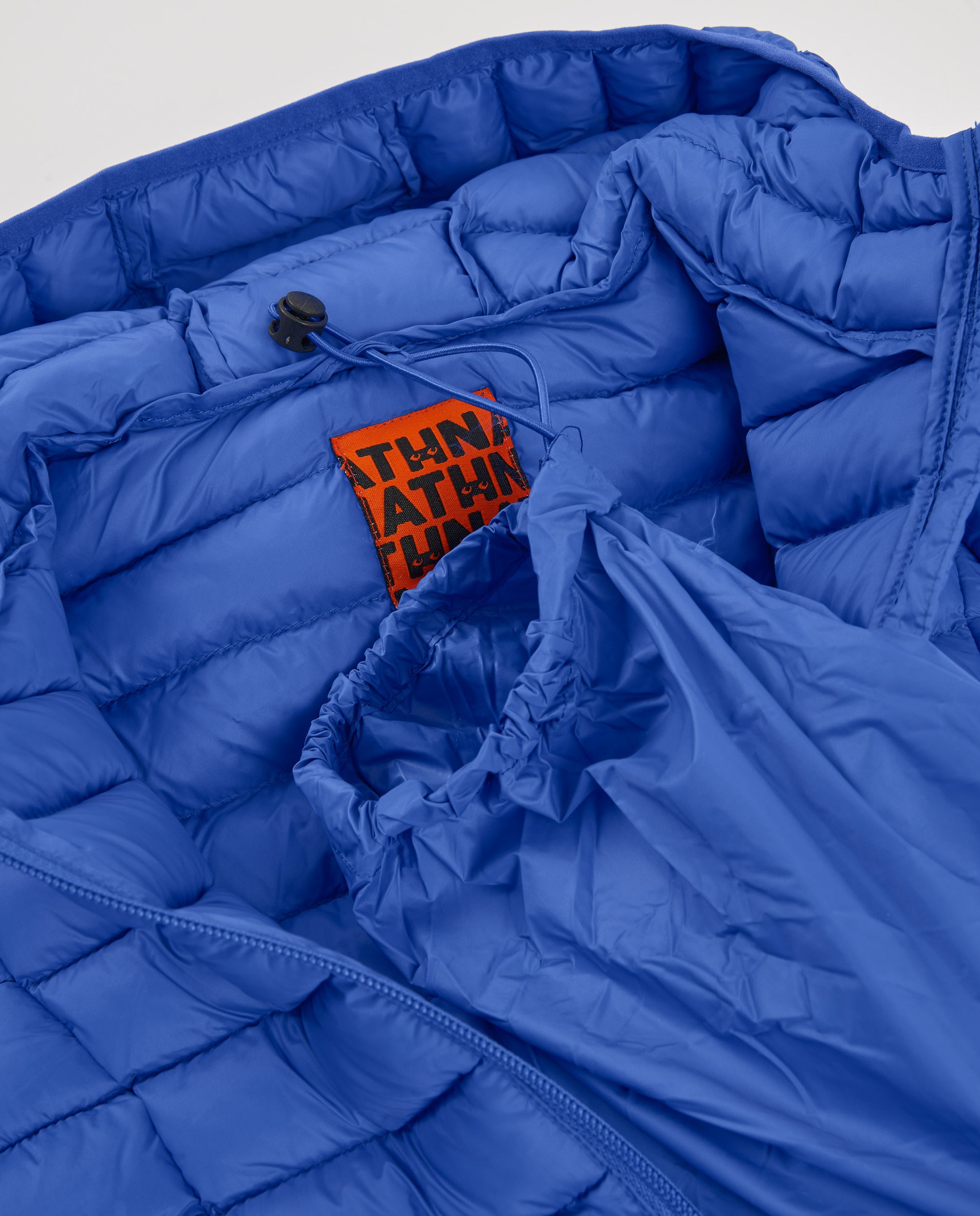 Chaqueta acolchada de niño color azul con capucha