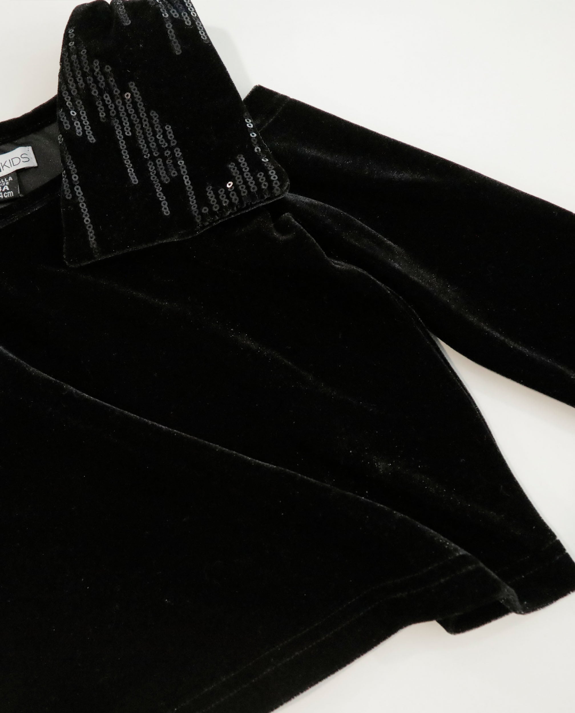 Blusa de niña en terciopelo con detalle de lentejuelas en el