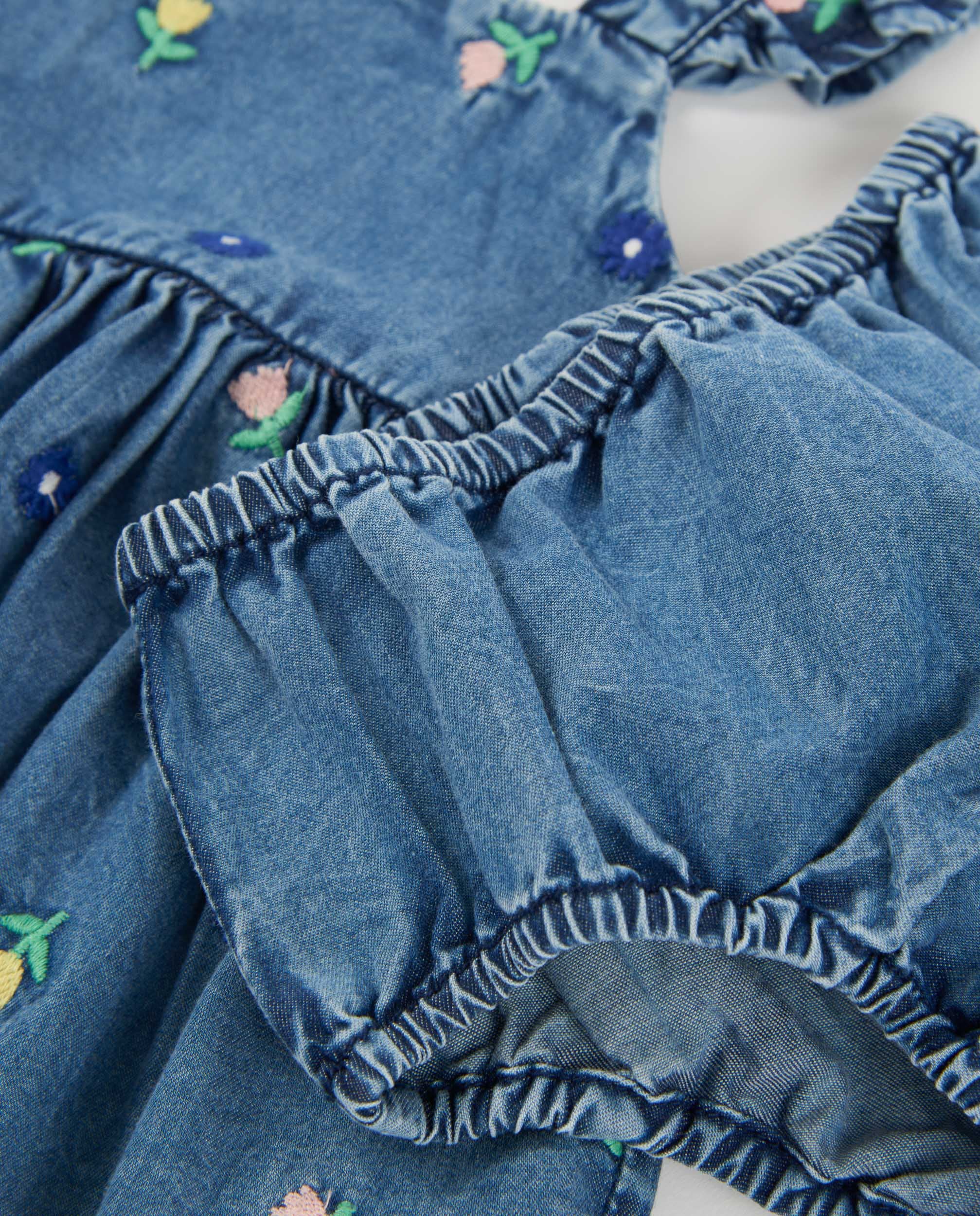 Vestido de recién nacido de plana en denim