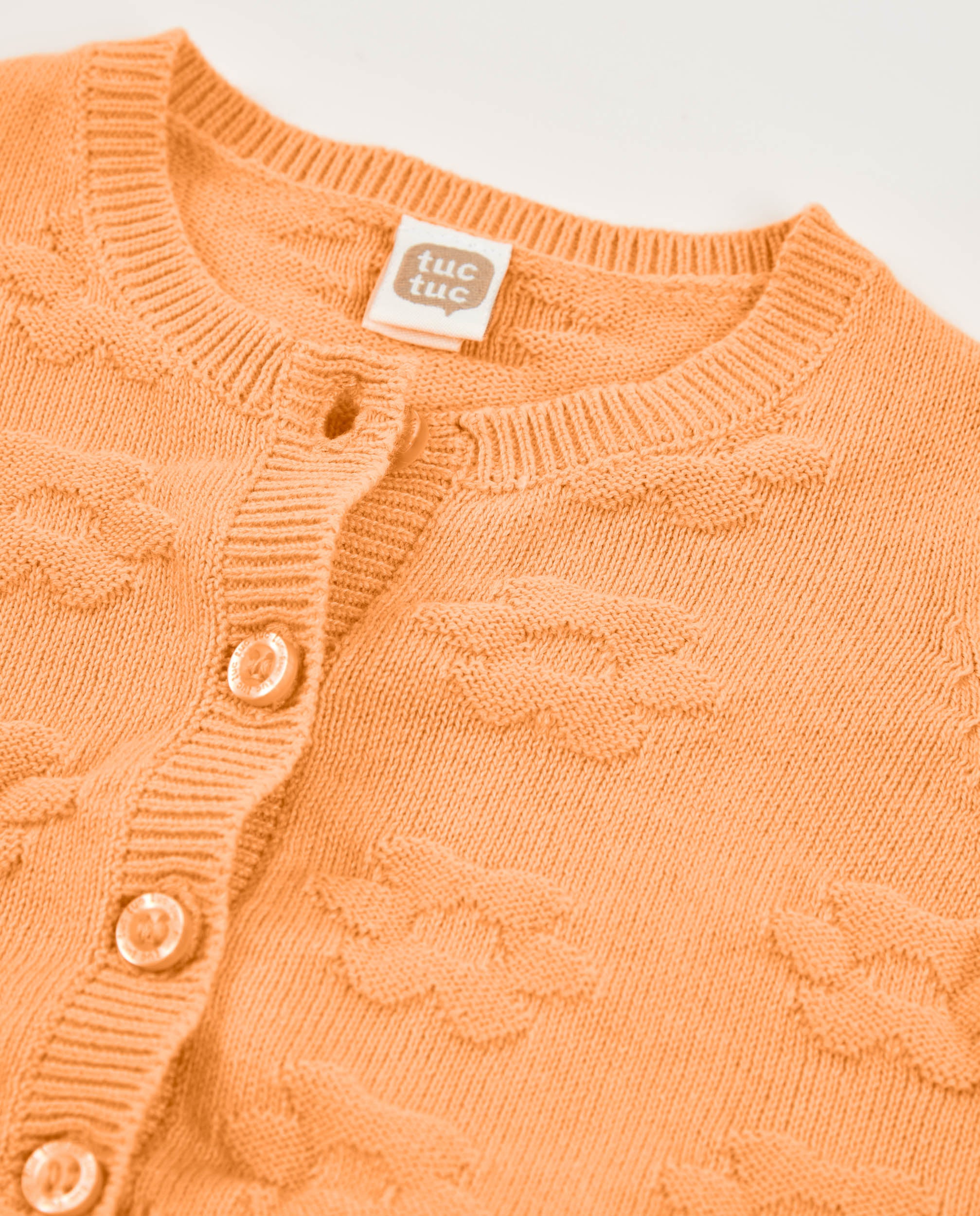 Chaqueta de recién nacido de tricot y diseño en relieve
