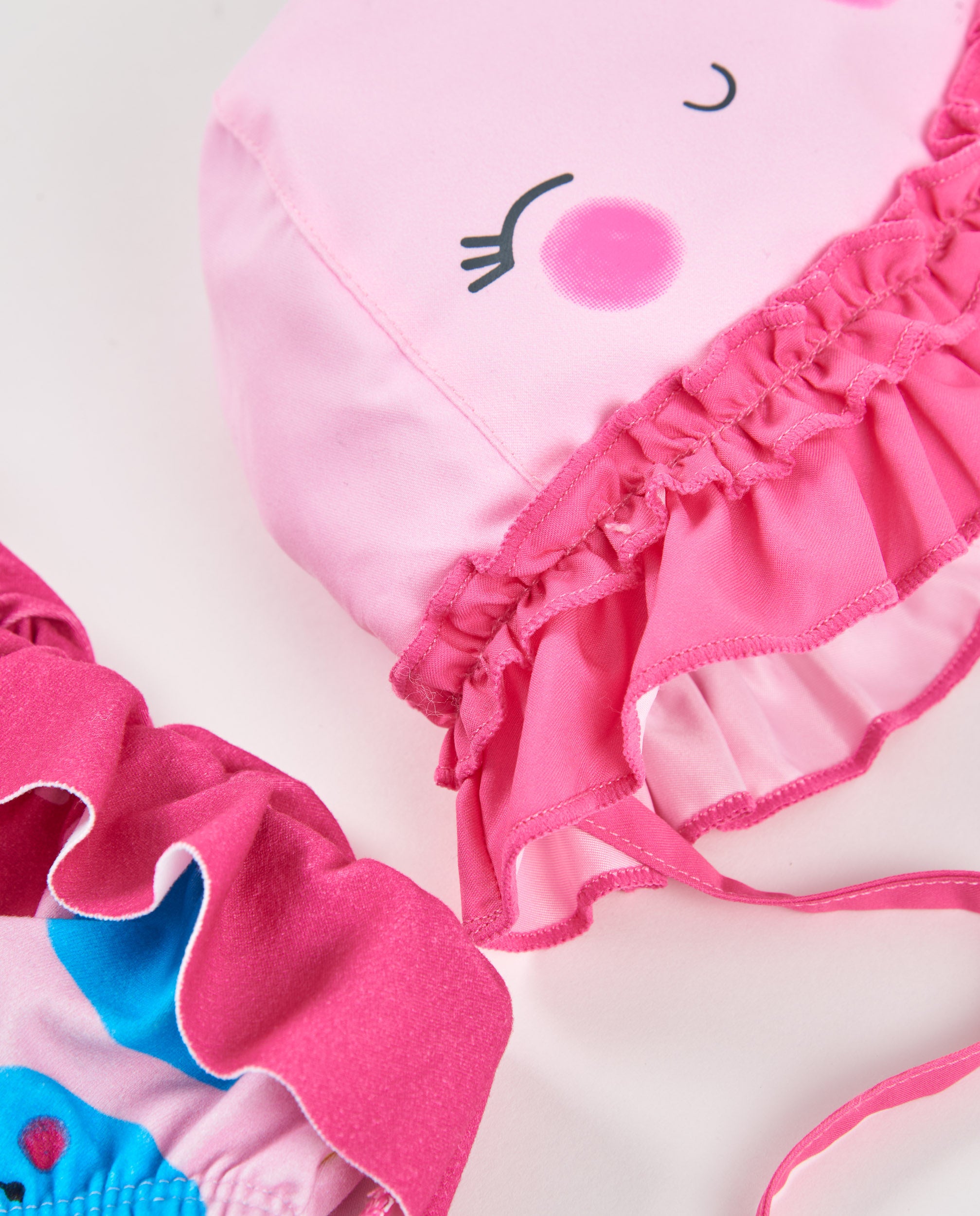 Bañador de recién nacido de plana con volante decorativo