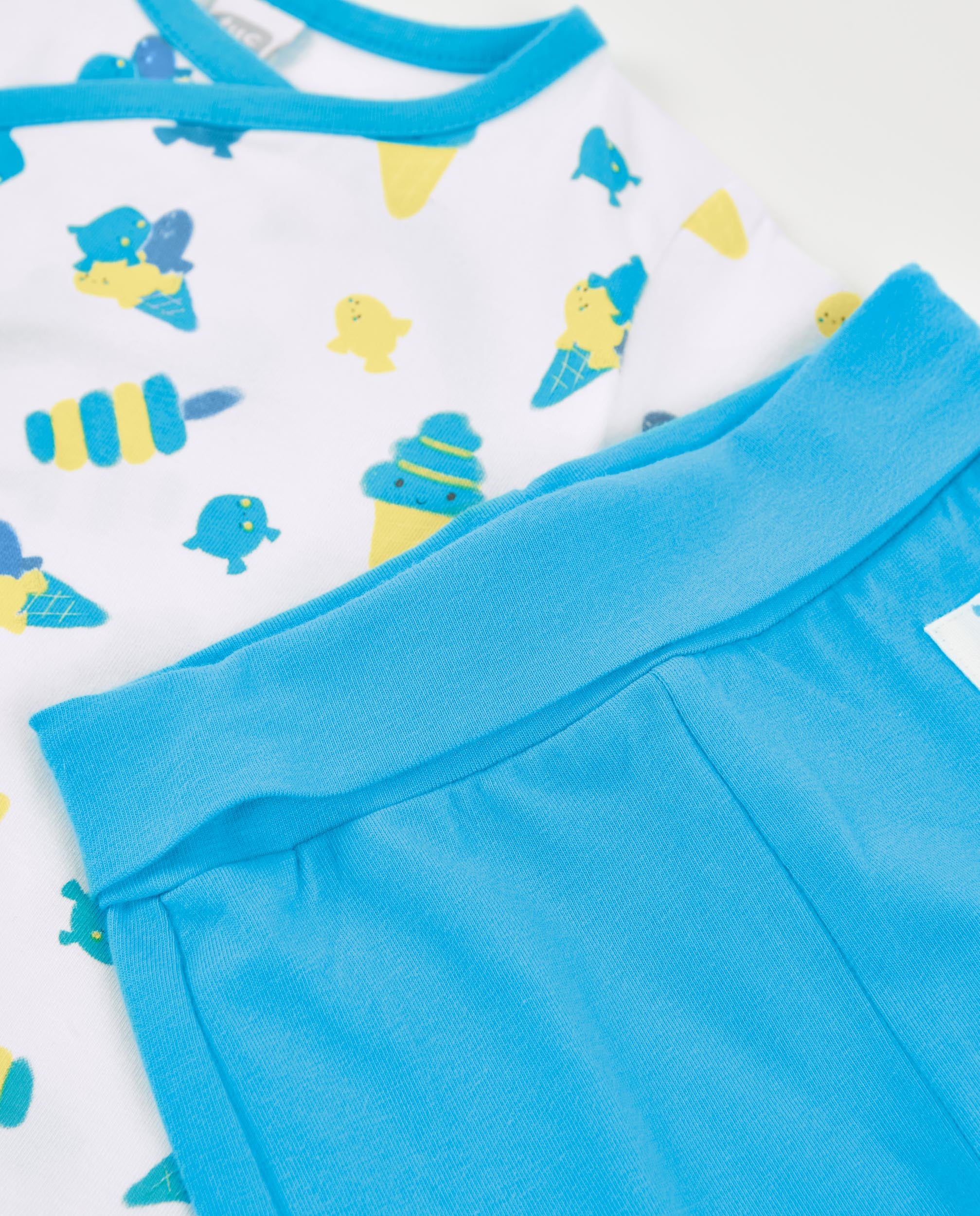 Conjunto de recién nacido de punto y estampado peces