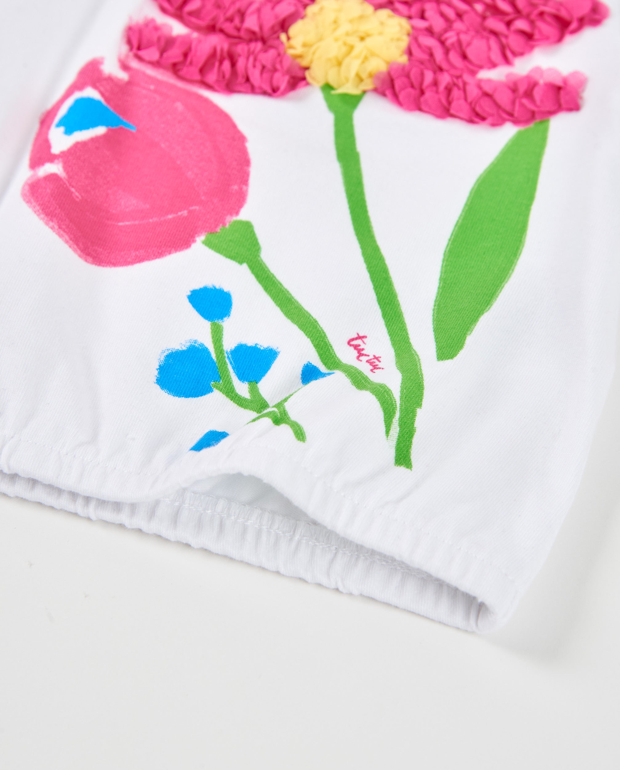 Camiseta de niña de punto y flor en relieve