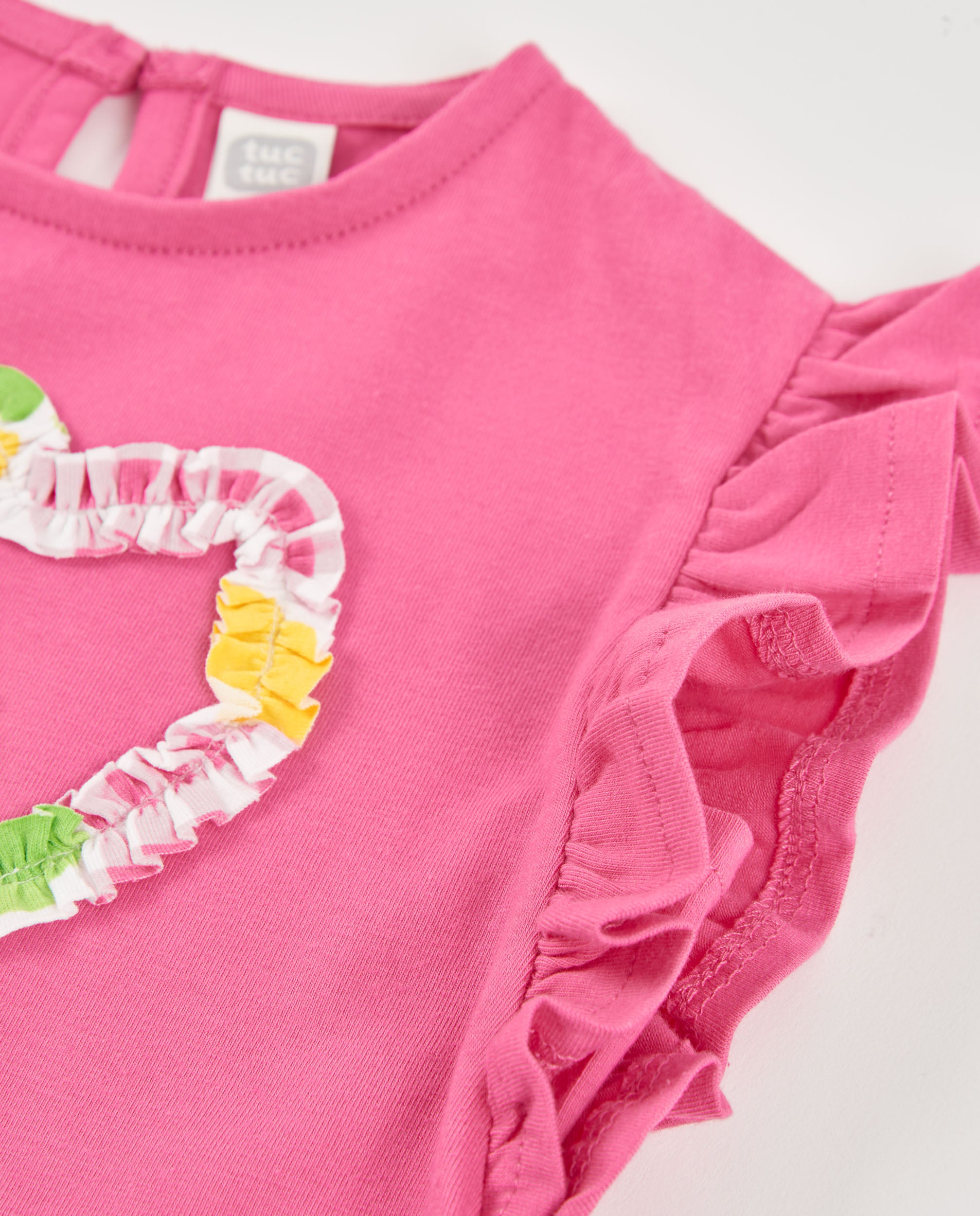 Camiseta de niña de punto y flor en relieve