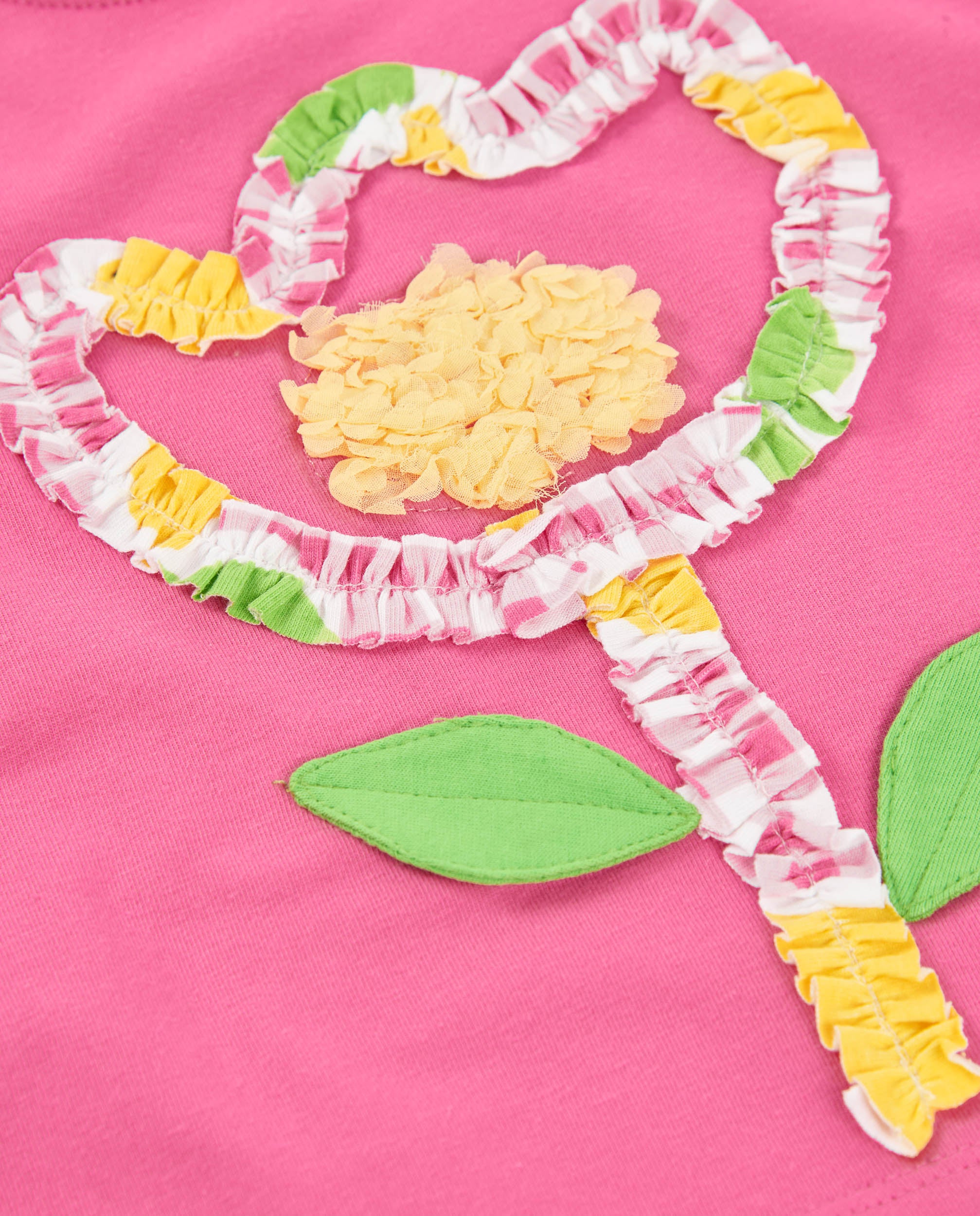 Camiseta de niña de punto y flor en relieve