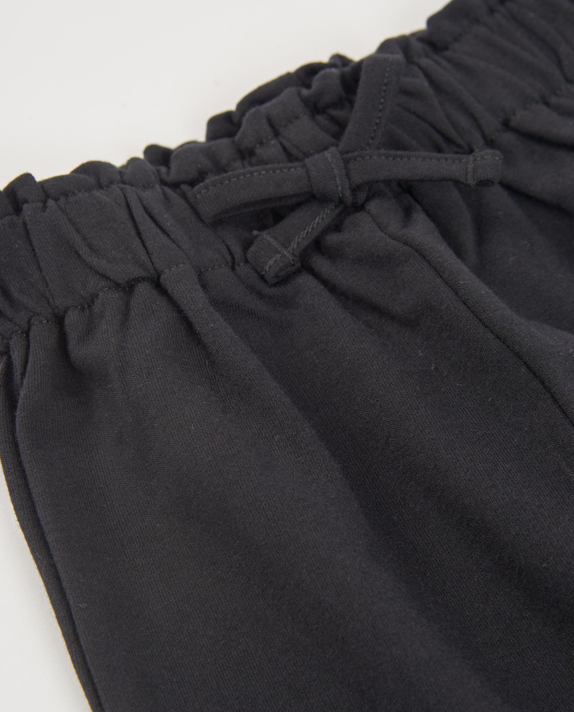 Pantalones de niña de punto y cintura elástica