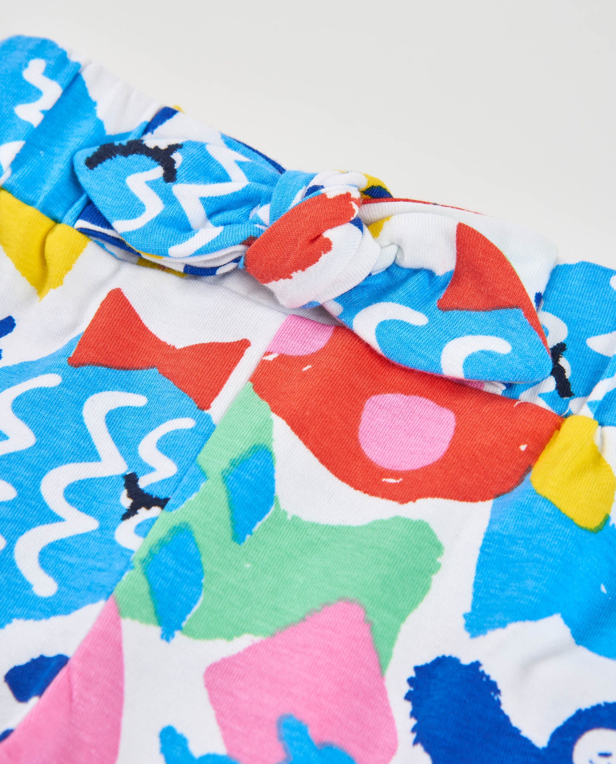 Pantalones de niña de punto y estampado de peces