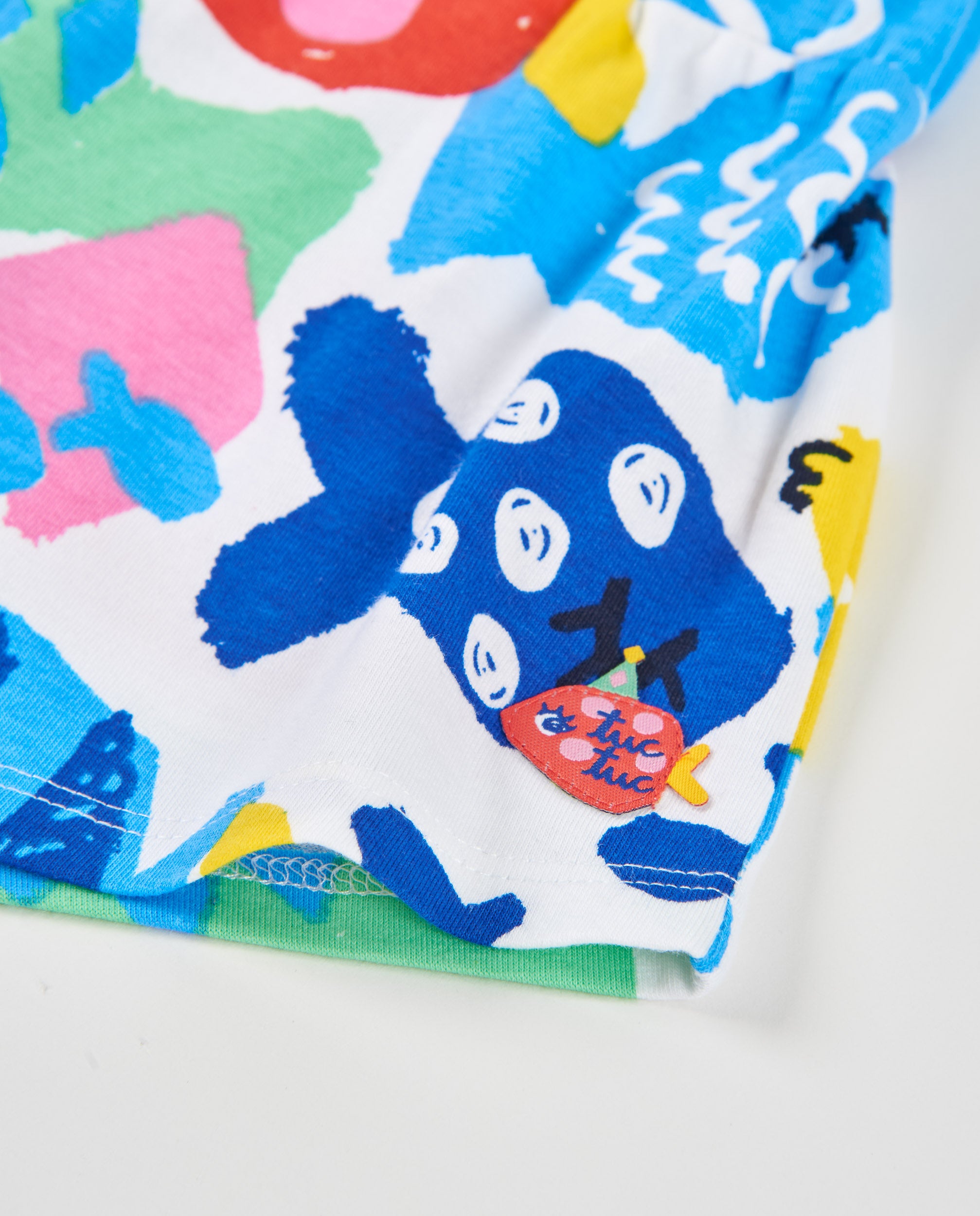 Pantalones de niña de punto y estampado de peces