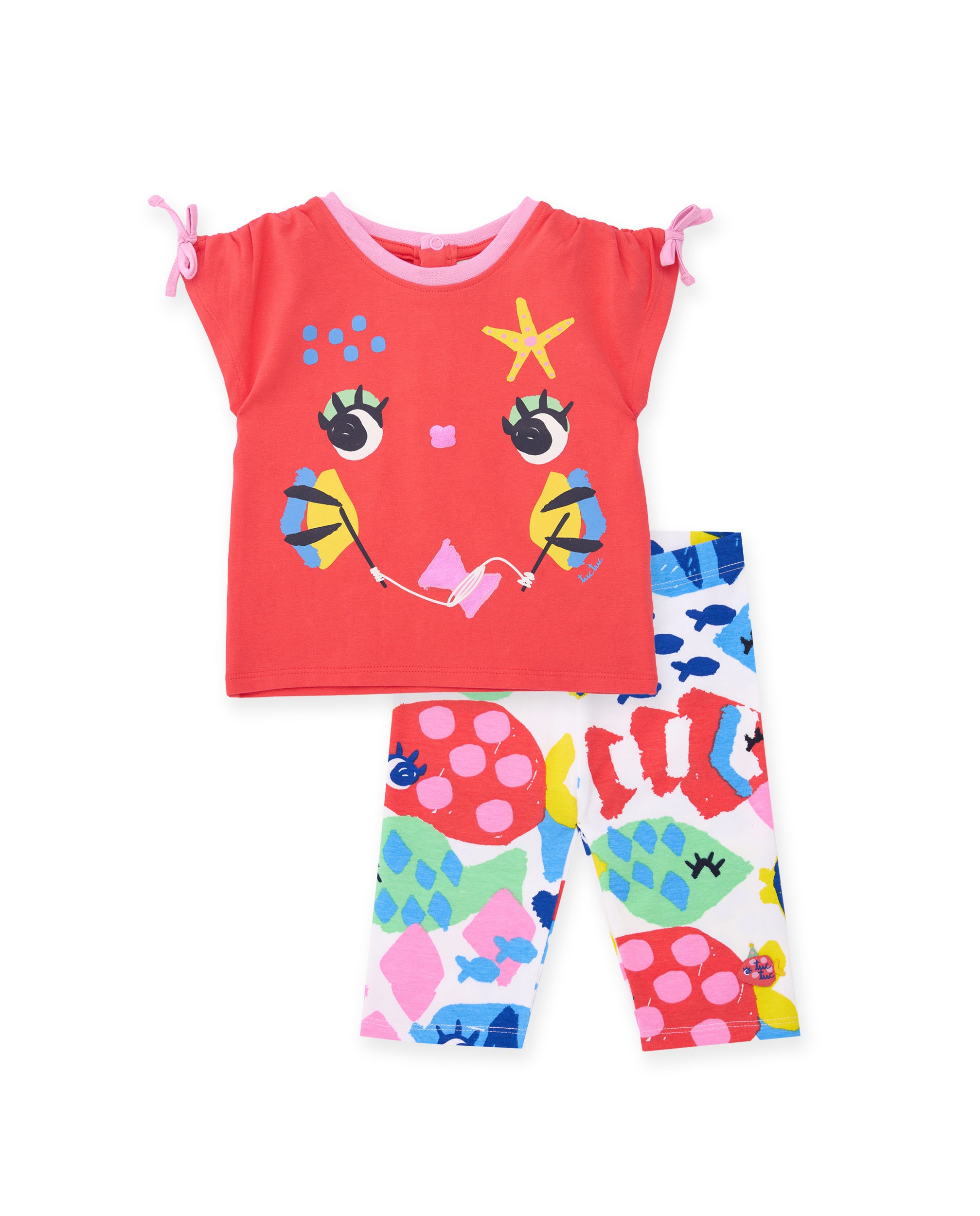 Conjunto de niña de punto y lazos en mangas