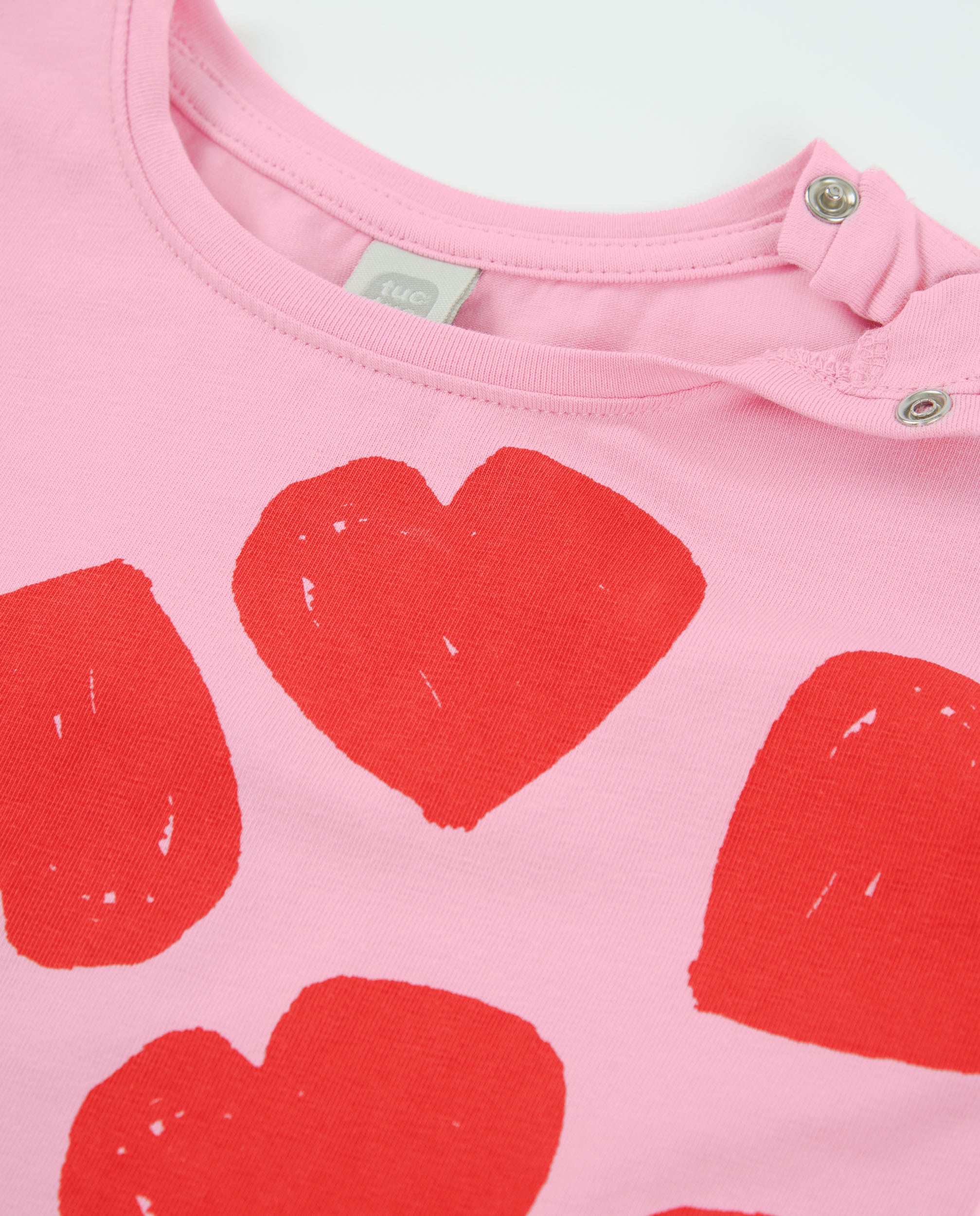 Camiseta de niña de punto y estampado corazones