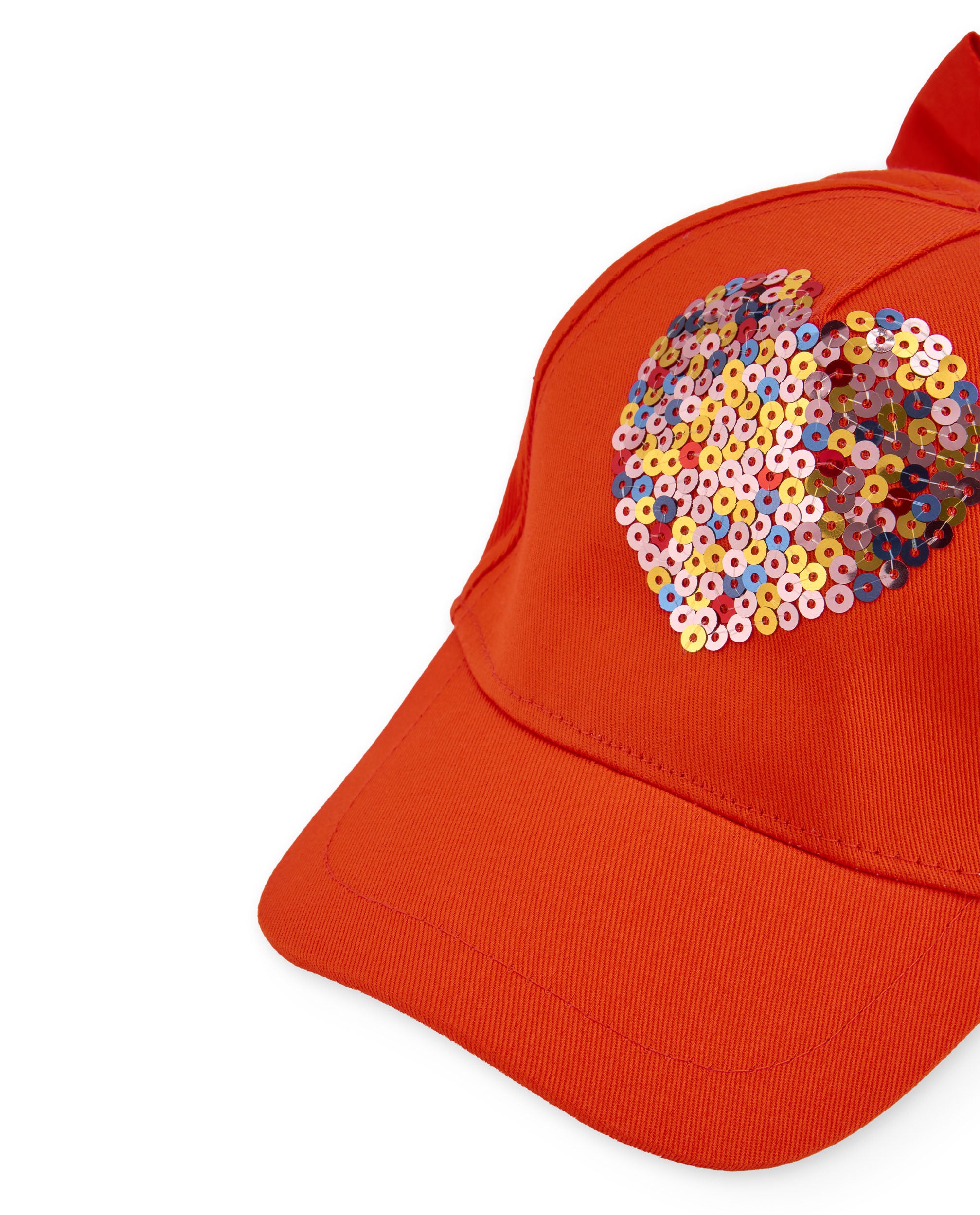 Gorra de niña de plana con corazón de lentejuelas