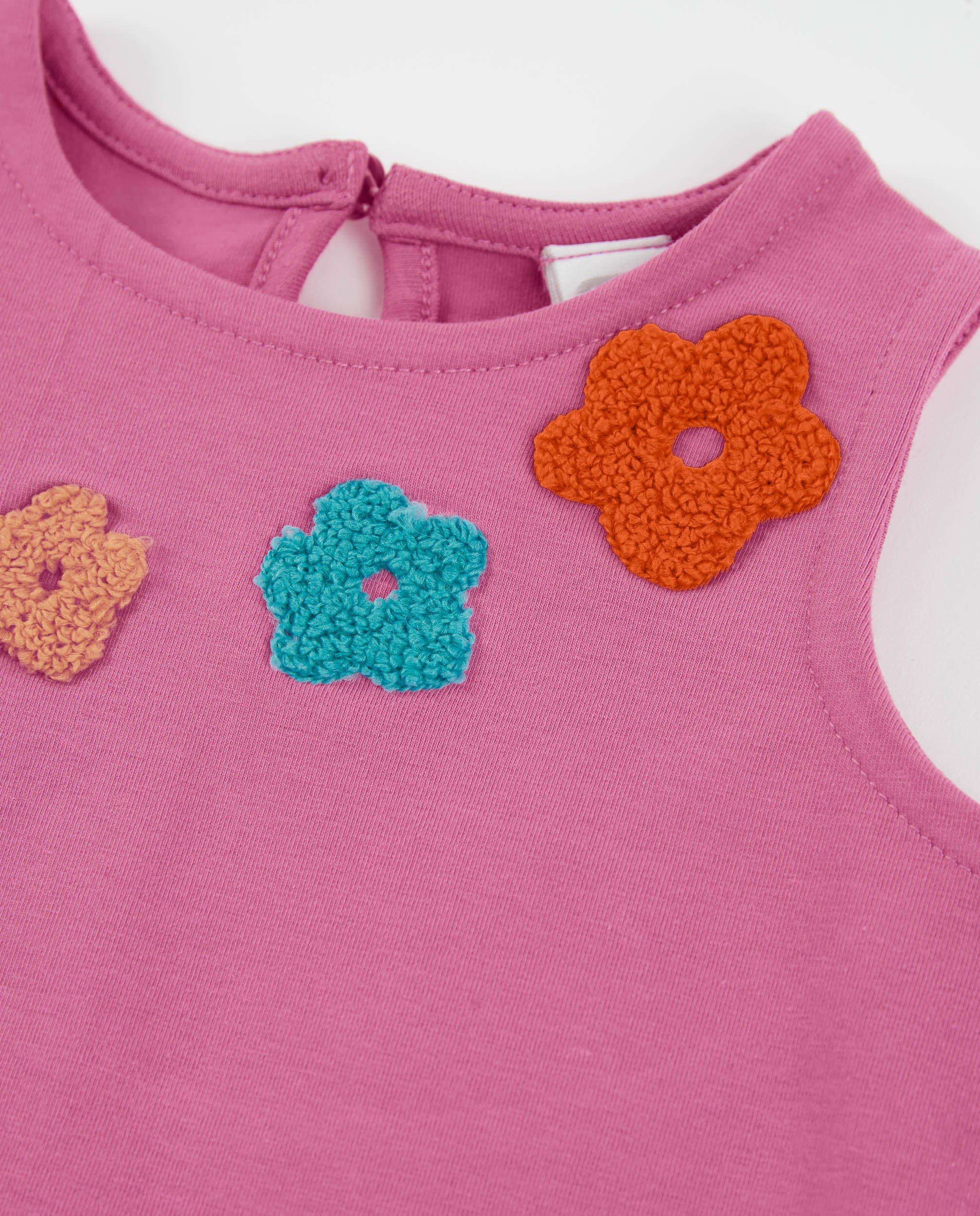 Camiseta de niña de punto con volante lateral