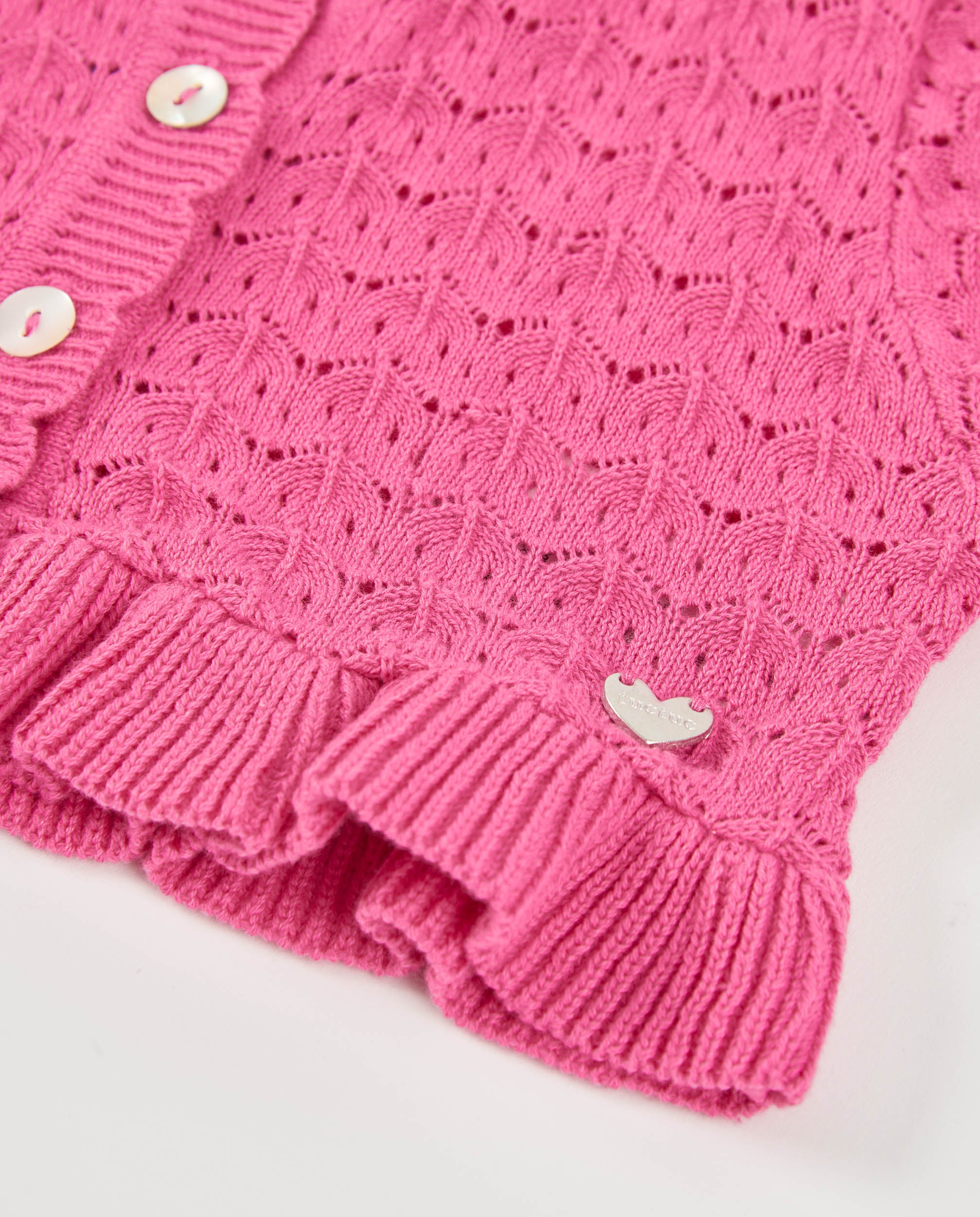 Chaqueta de niña de tricot y calado decorativo
