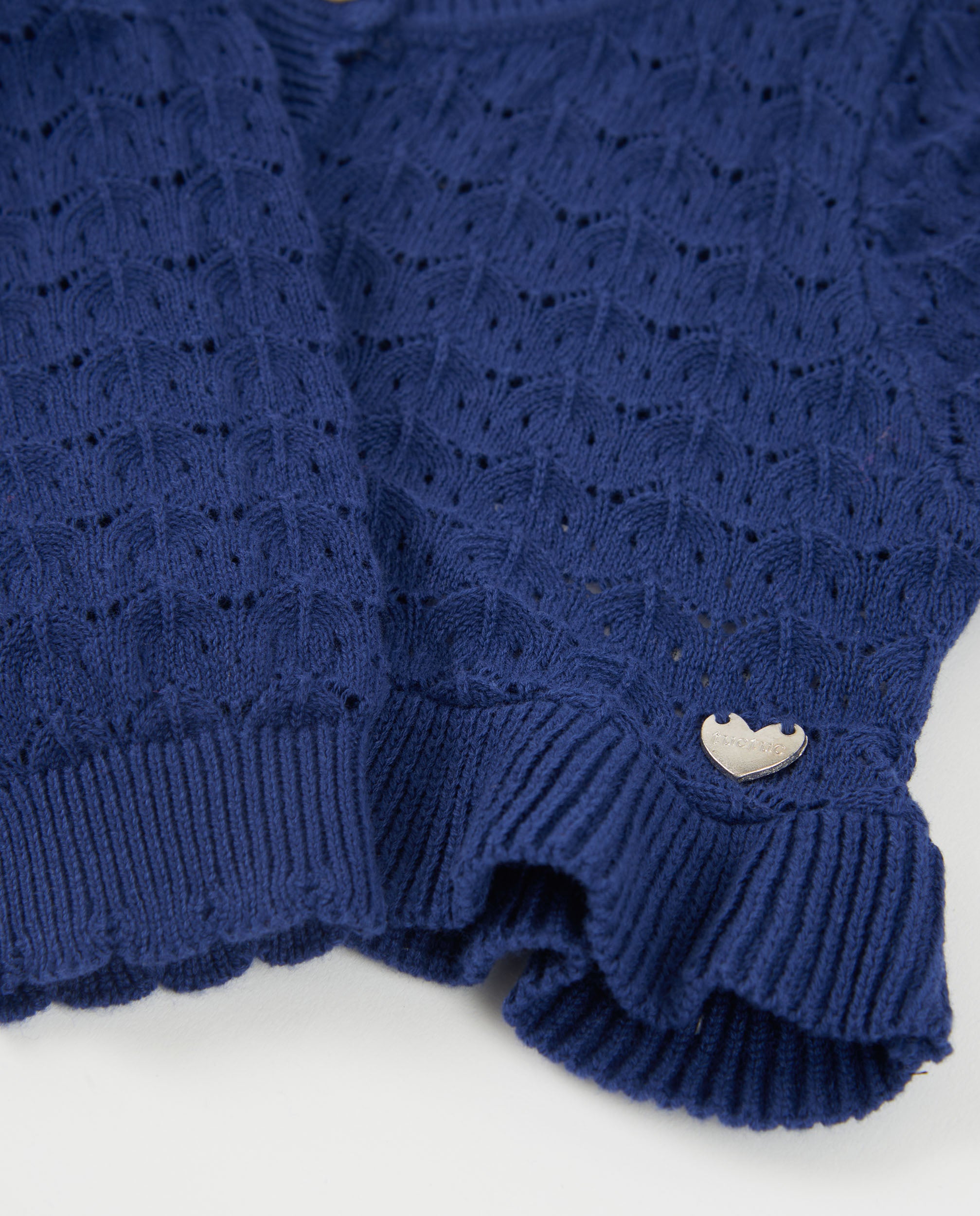 Chaqueta de niña de tricot con diseño calado