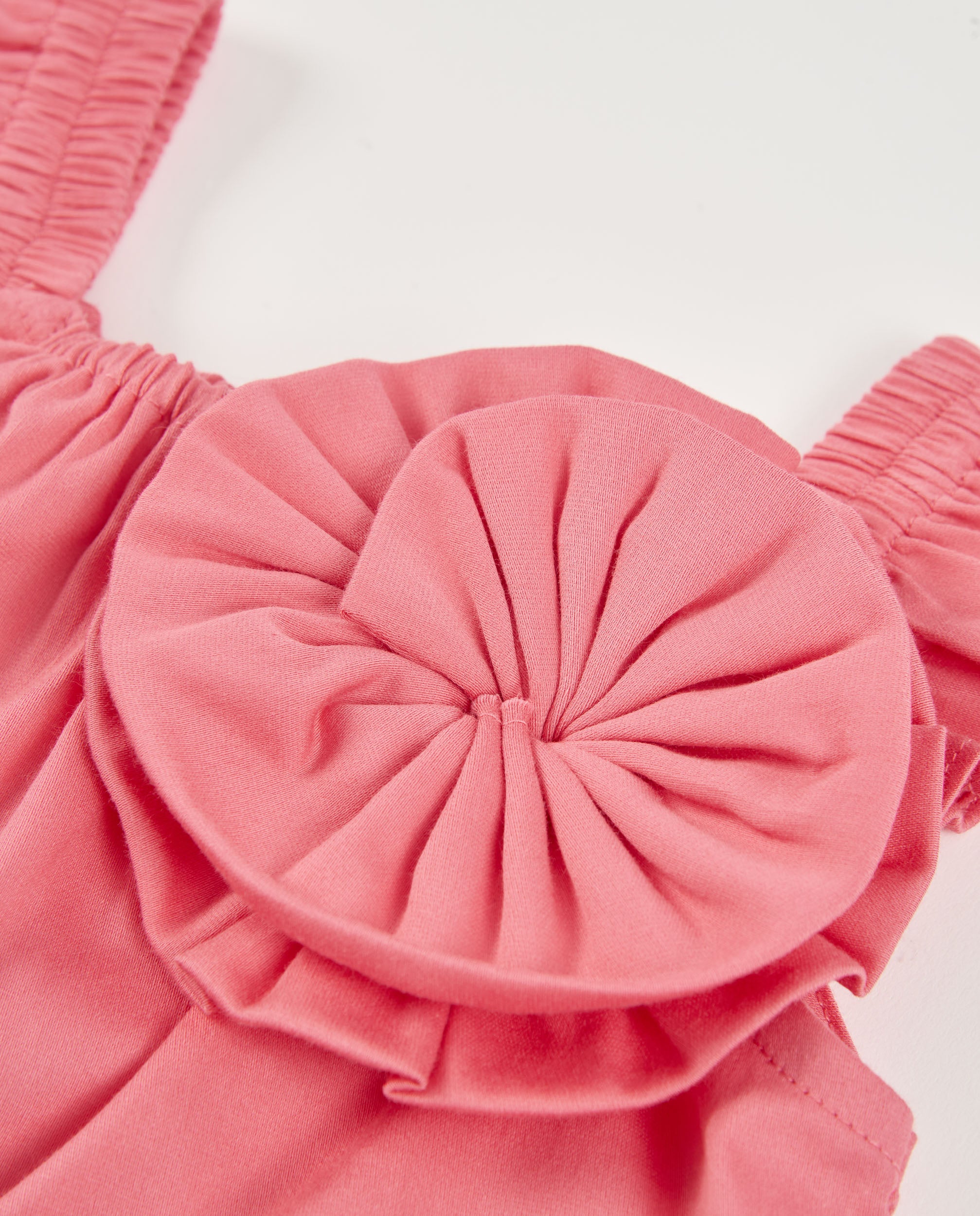 Blusa de niña de plana y gran flor frontal
