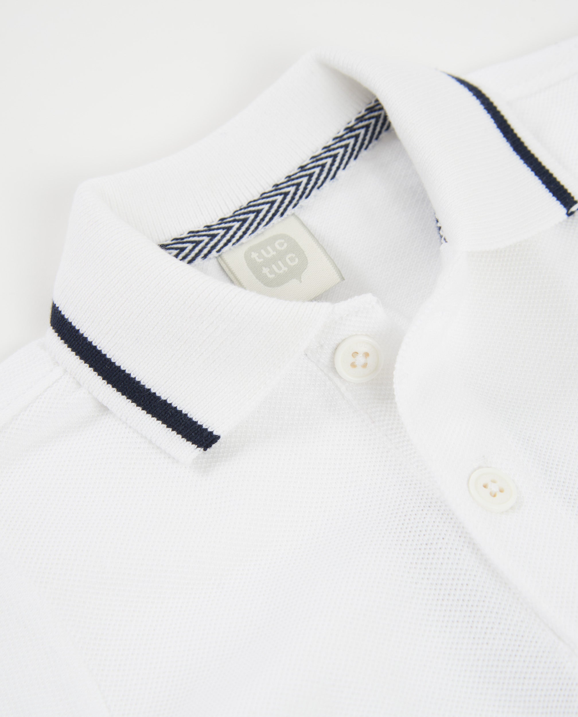 Polo de niño de punto con bordado de velero