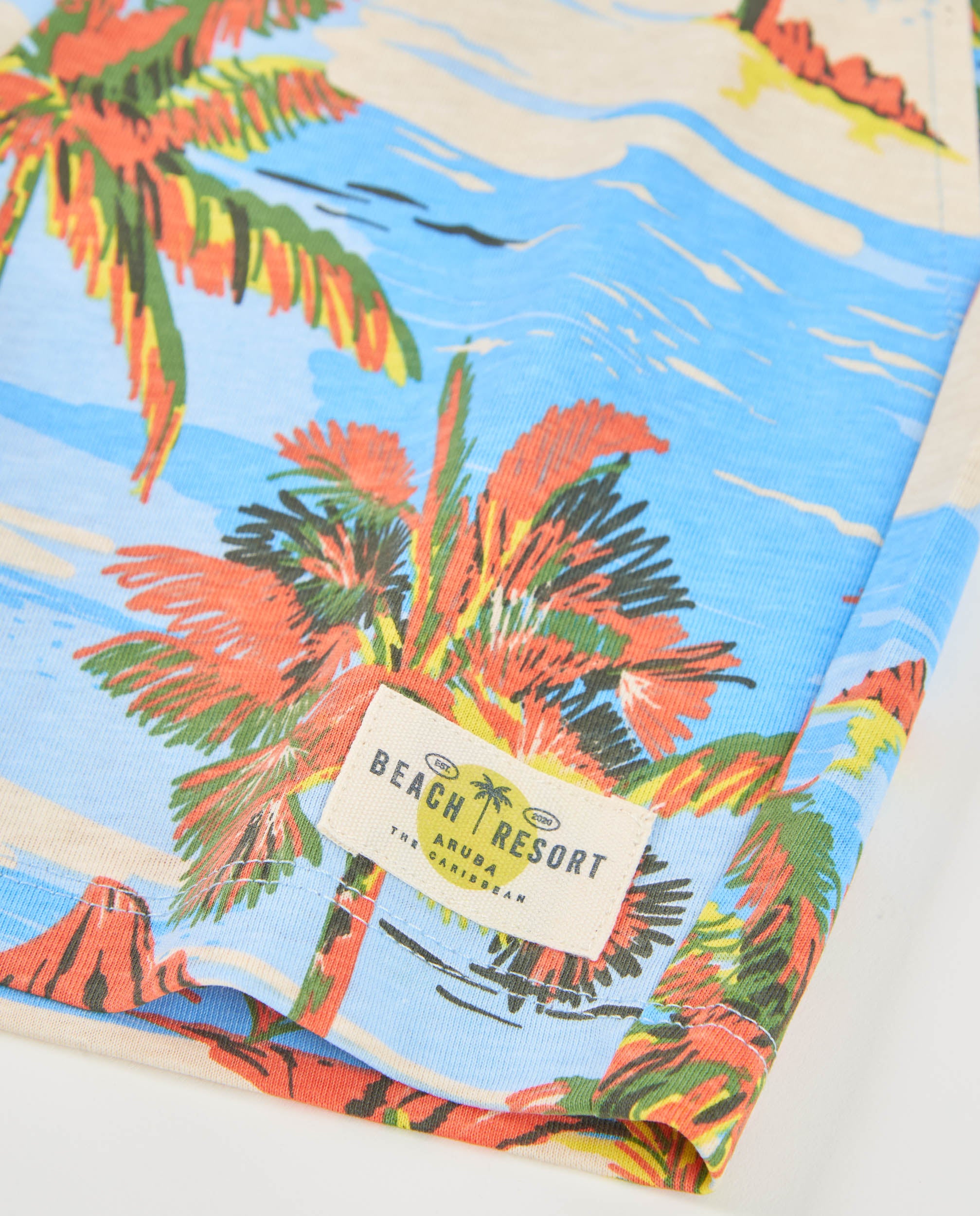 Bermuda de niño de punto con estampado de palmeras