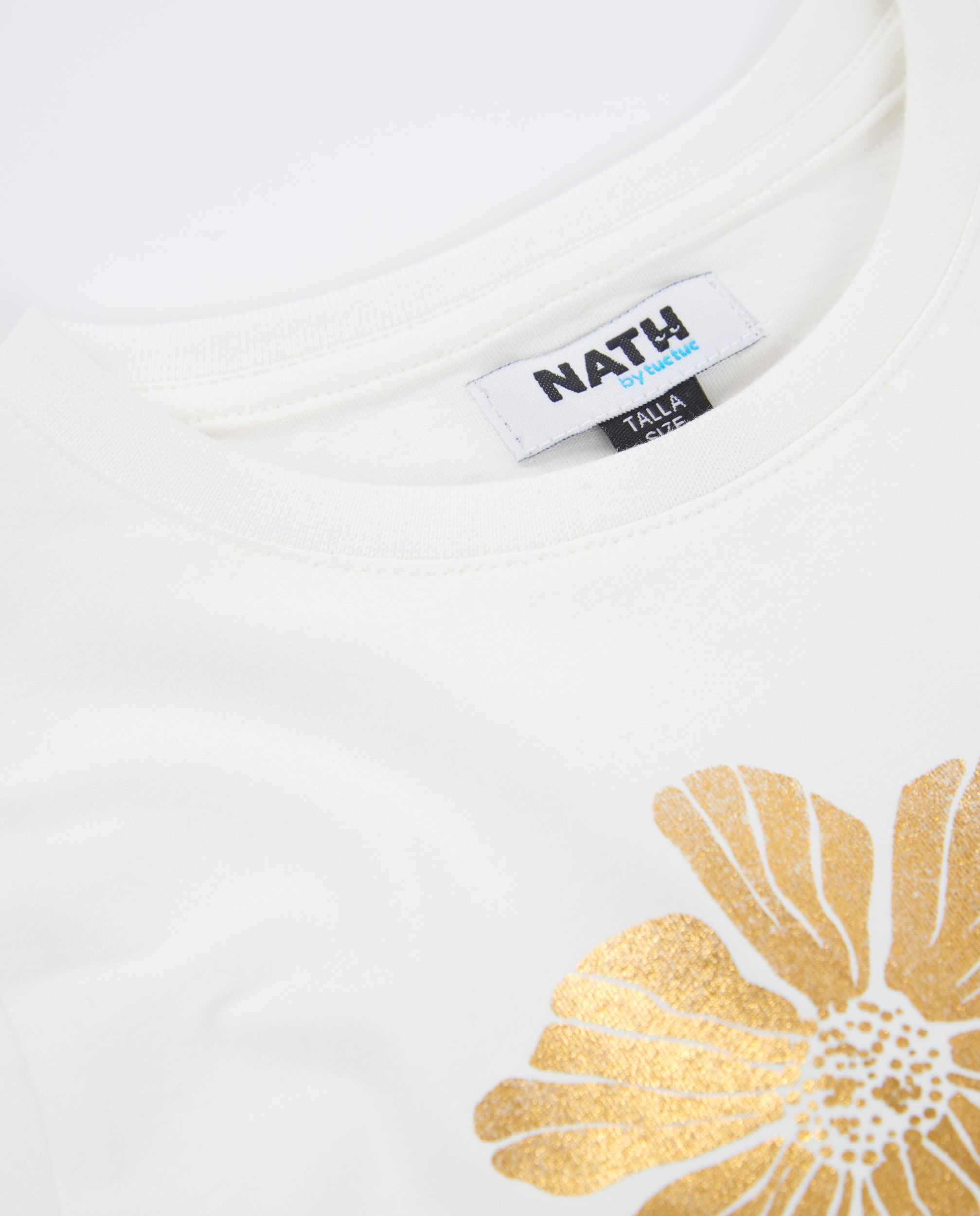 Camiseta de niña de punto con estampado dorado