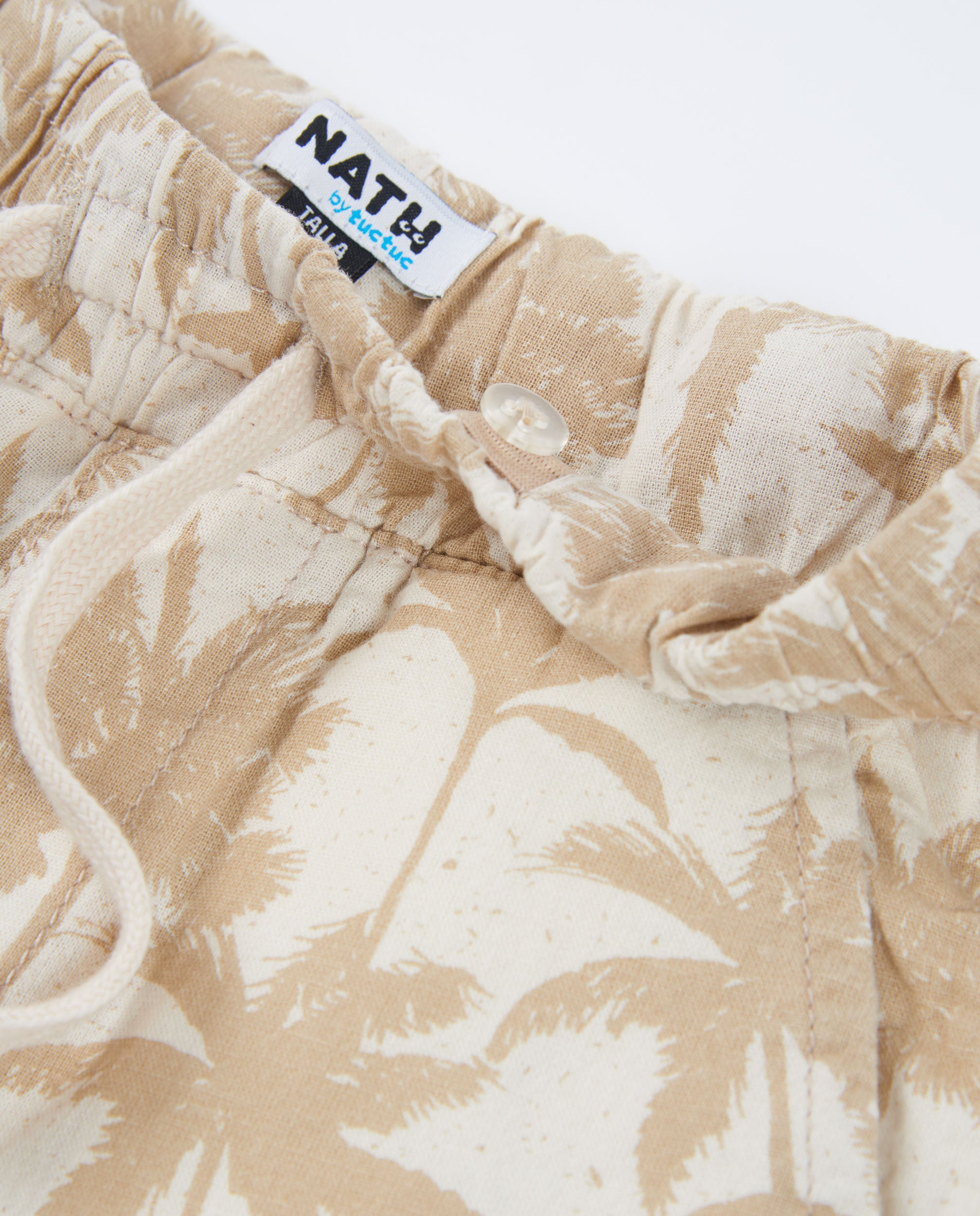 Bermuda de niño de plana con estampado de palmeras
