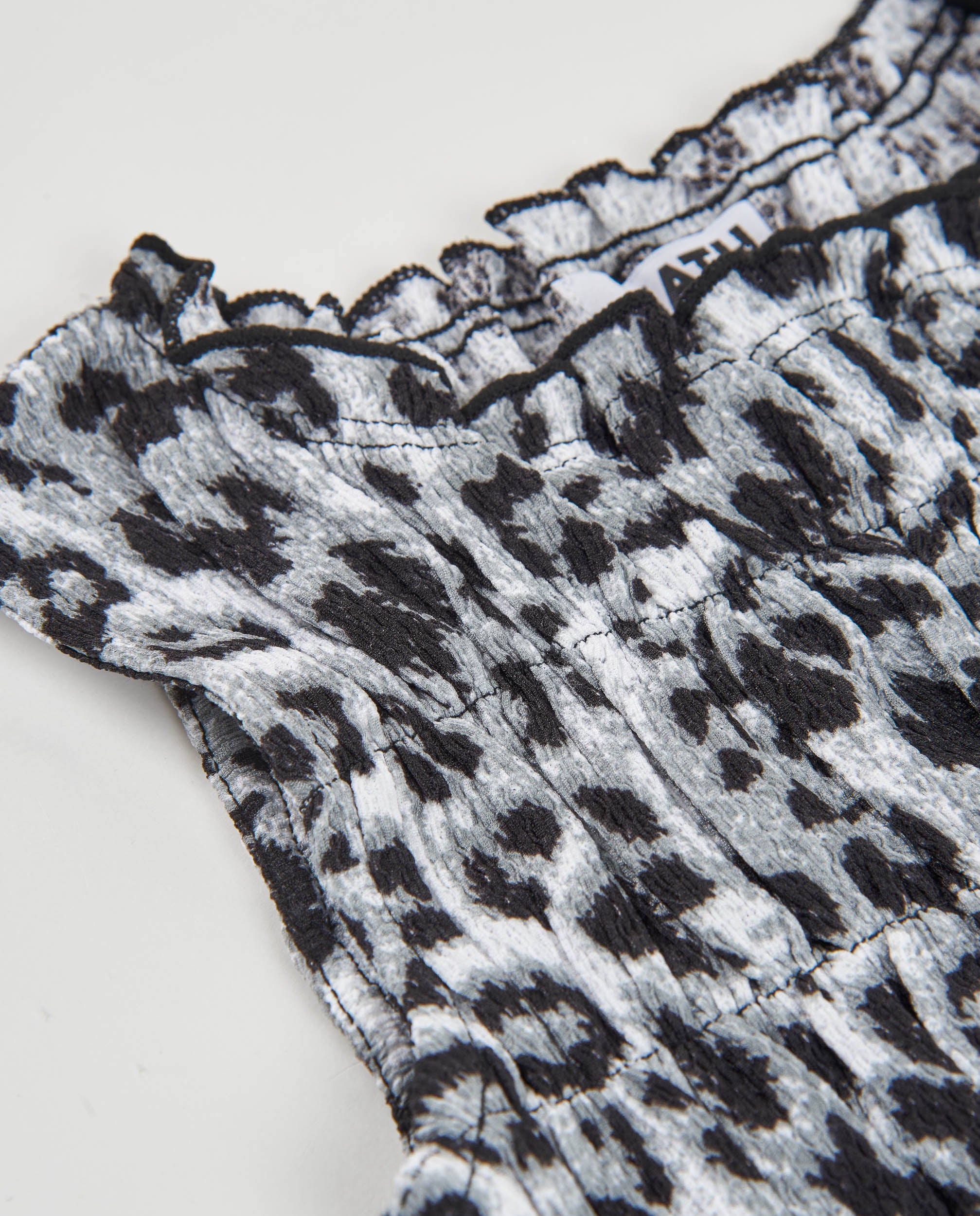 Top de niña de plana con diseño animal print