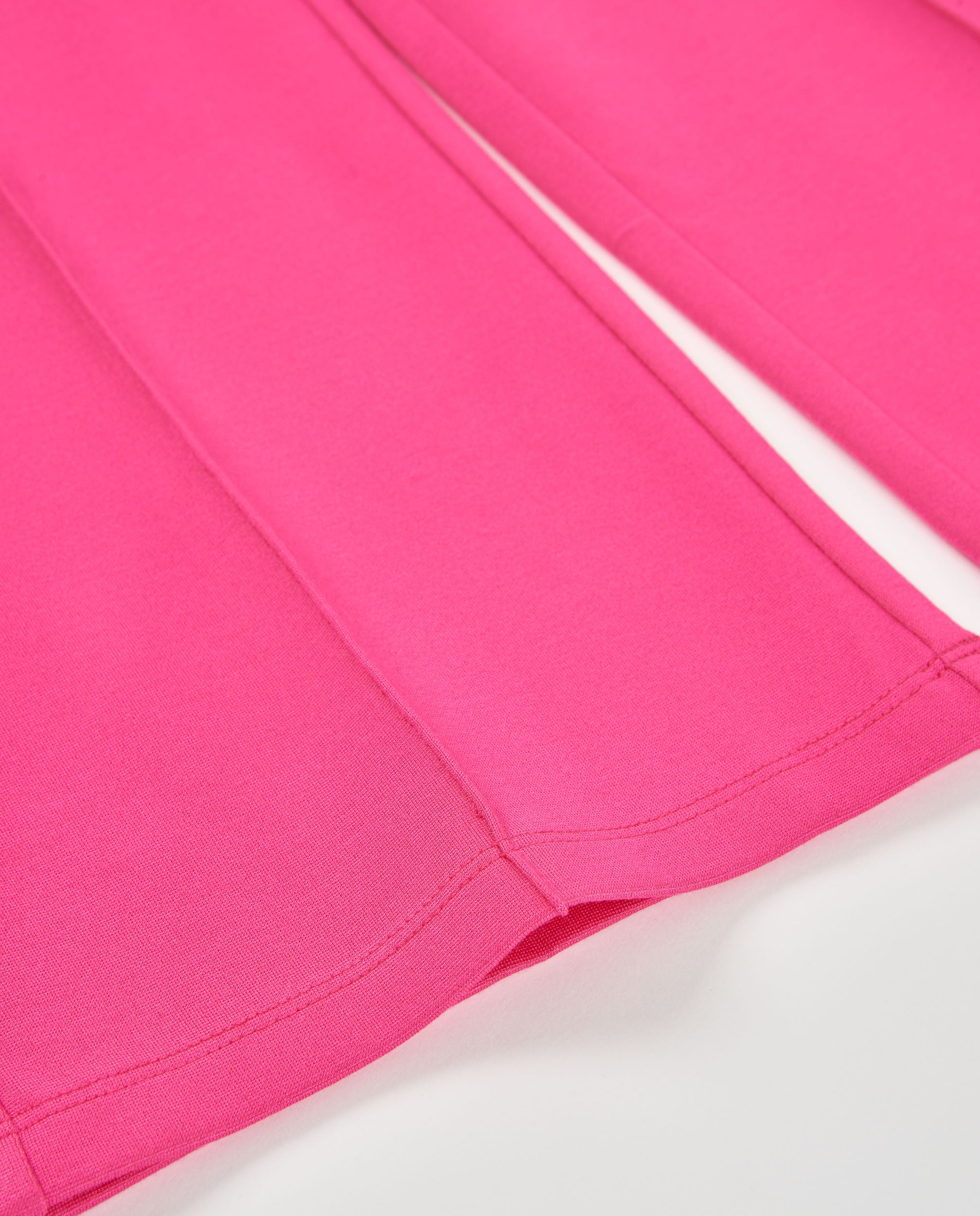 Pantalones de niña de punto con costuras decorativas
