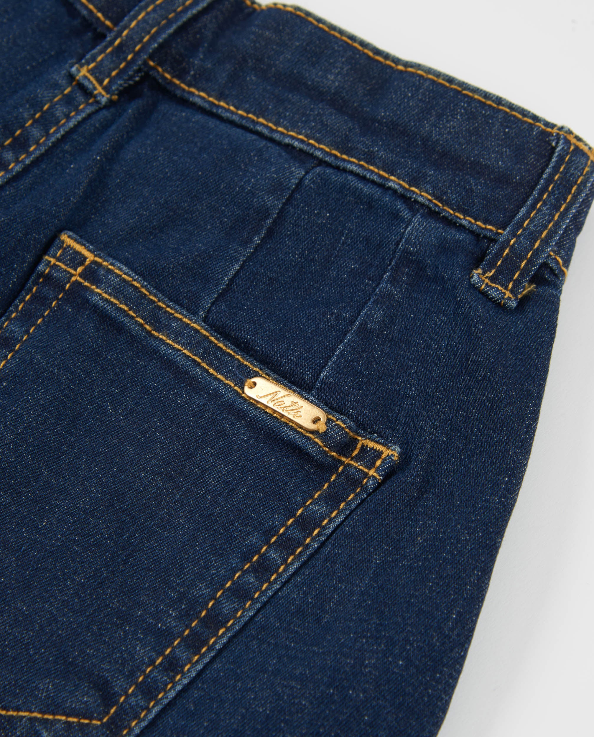 Short de niña de plana y tejido denim oscuro
