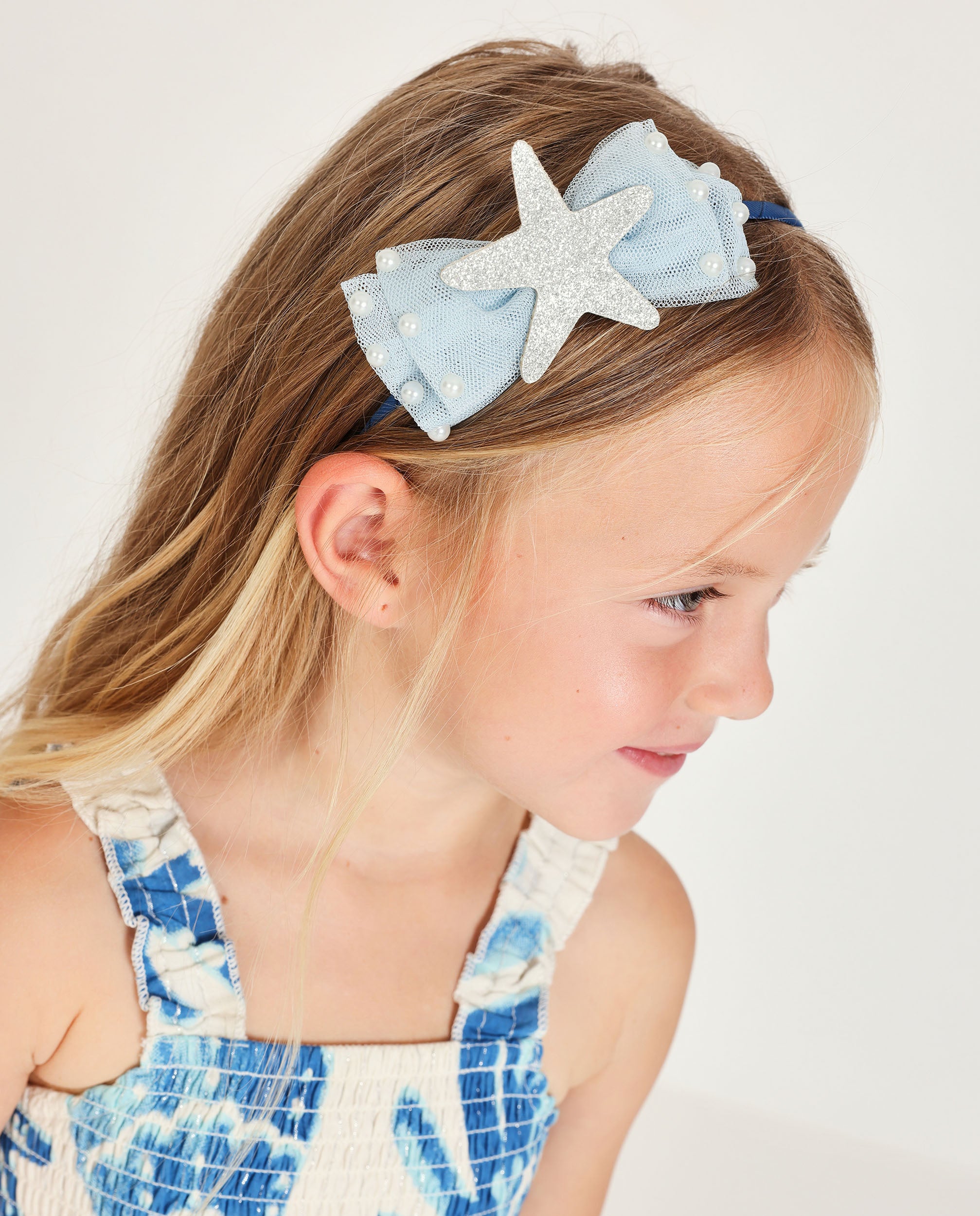 Diadema de niña de plana con lazo de tul